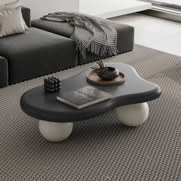Loheer - 40 Inch Cloud Shaped Coffee Table Black Top White Ball Legs Modern Low Profile Living Room Center Table - Black White