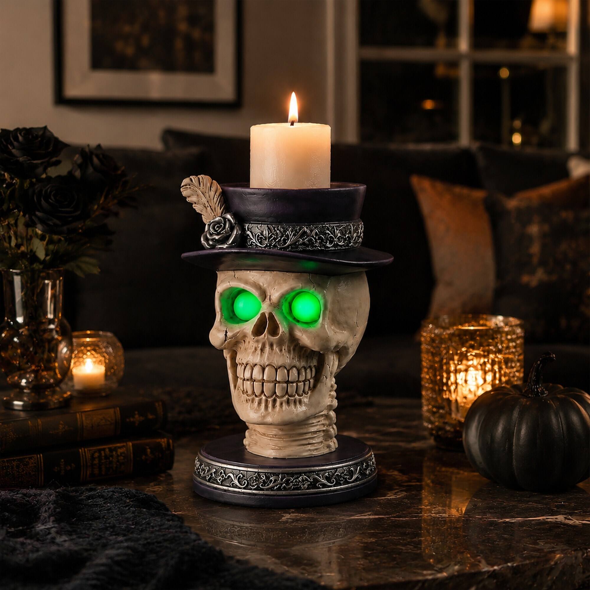 Left. RYHNUYNE - Gothic Skull Candle Holder Statue with Glowing Green LED Eyes and Victorian Feather Top Hat for Spooky Halloween - Black.