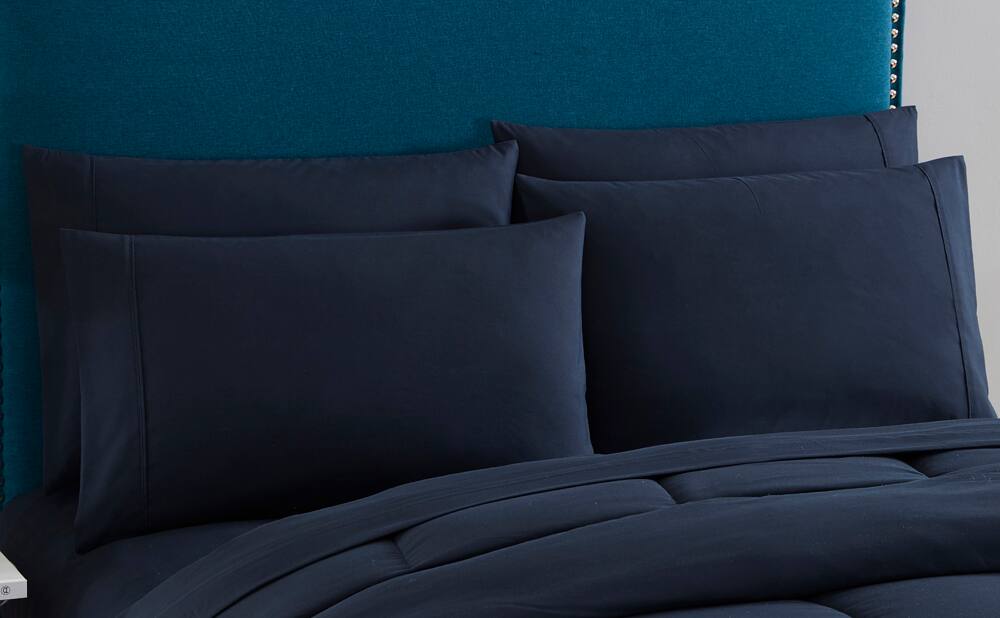 Angle. Sweet Home Collection - All Season Reversible Bed-in-A-Bag Solid Color Comforter & Sheet Set, Twin - Navy.