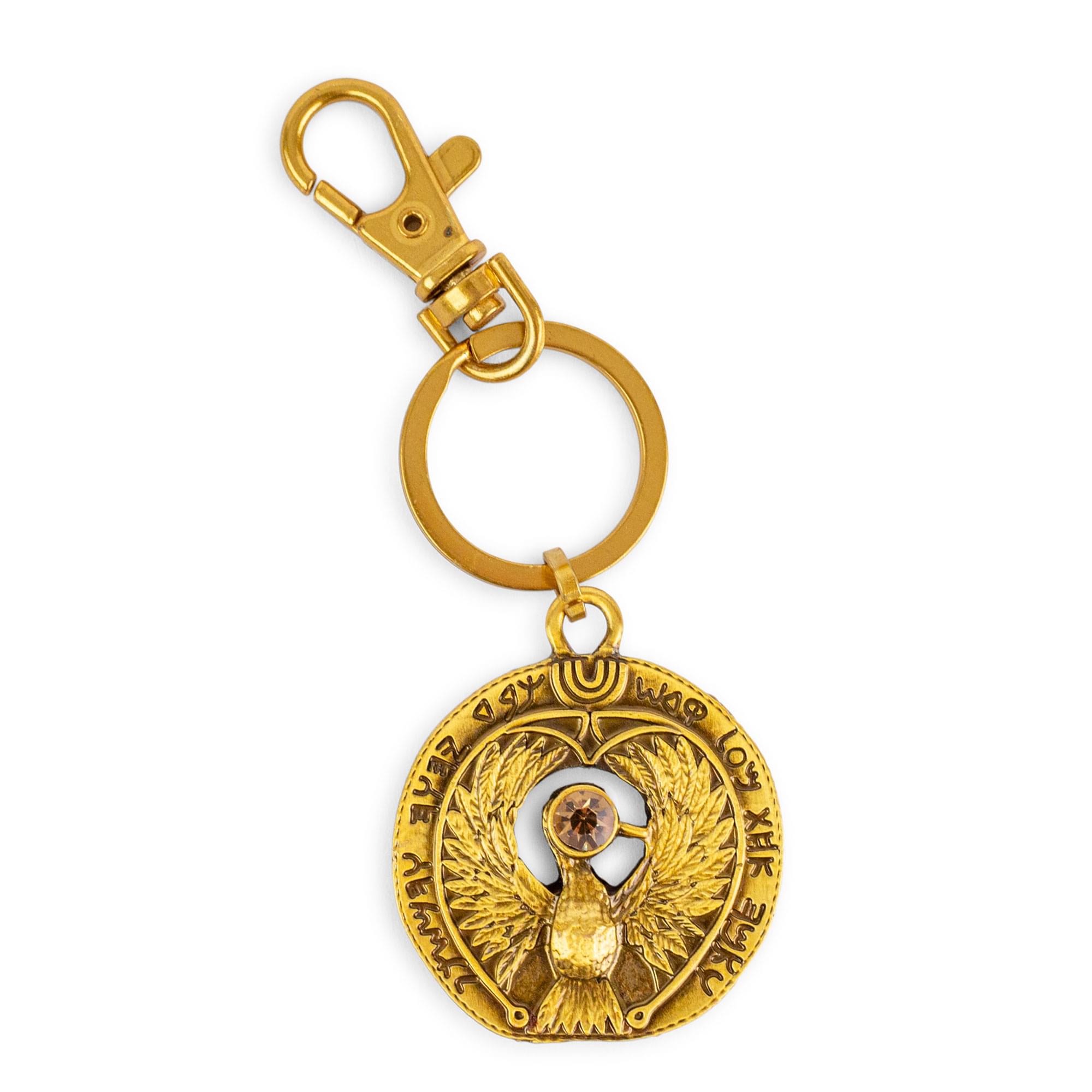 The keychain features an emblem with the text: "THE POWER OF THE EAGLE"