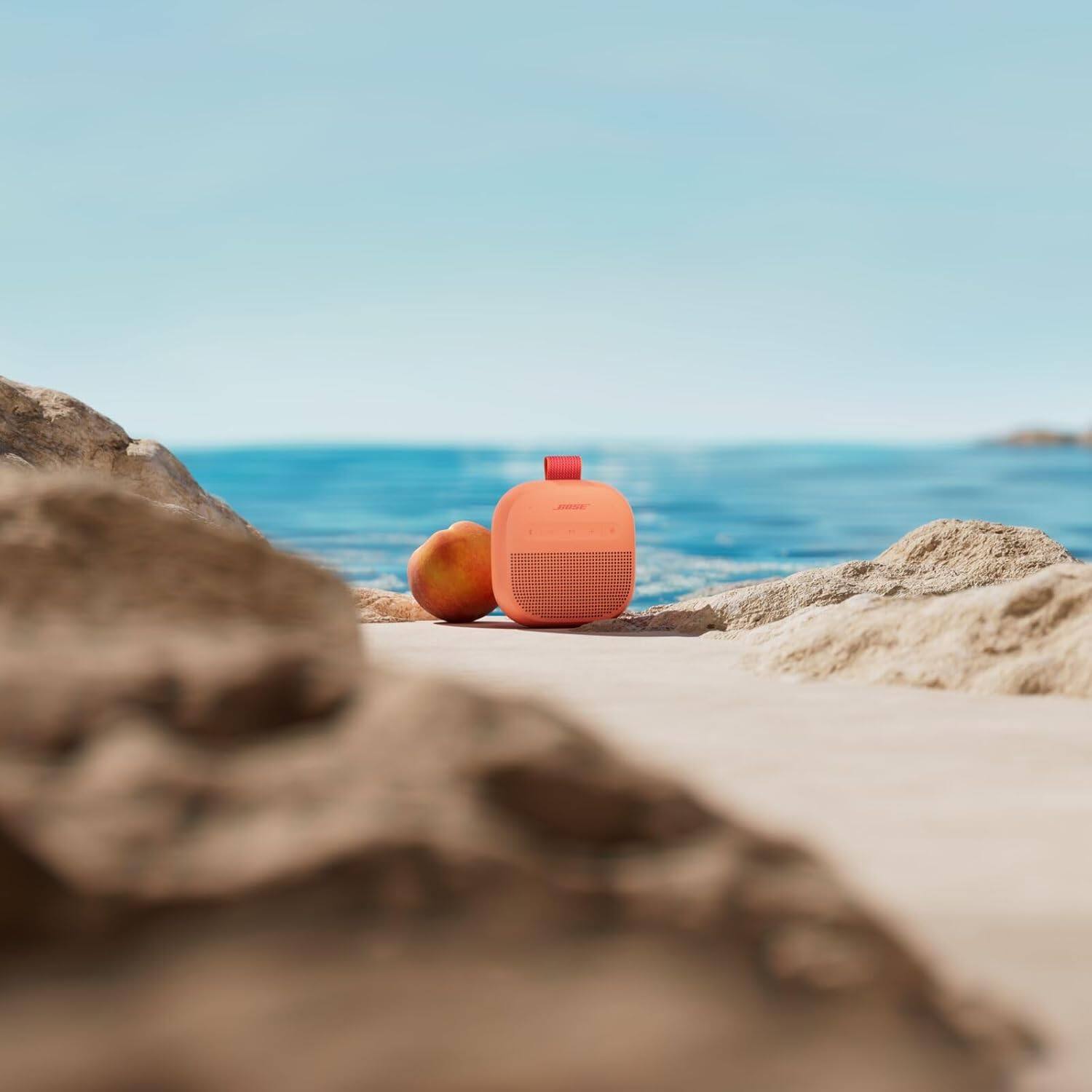 Alt View 3. Bose - Bose SoundLink Micro Portable Bluetooth Speaker (2nd Gen) Bundle with Fast Charger, Wireless Waterproof, (Sunset Peach) - Sunset Peach.