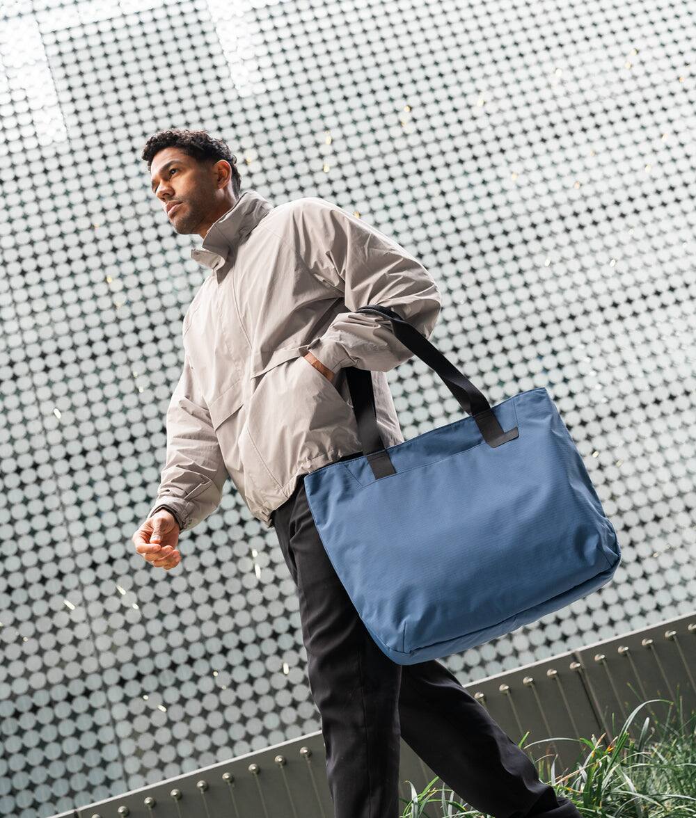 Back. ALPAKA - Elements Tote 20L Laptop Tote Bag with Padded 16" Sleeve,Open Top with Magnetic Closure - Blue Axoflux 210D.