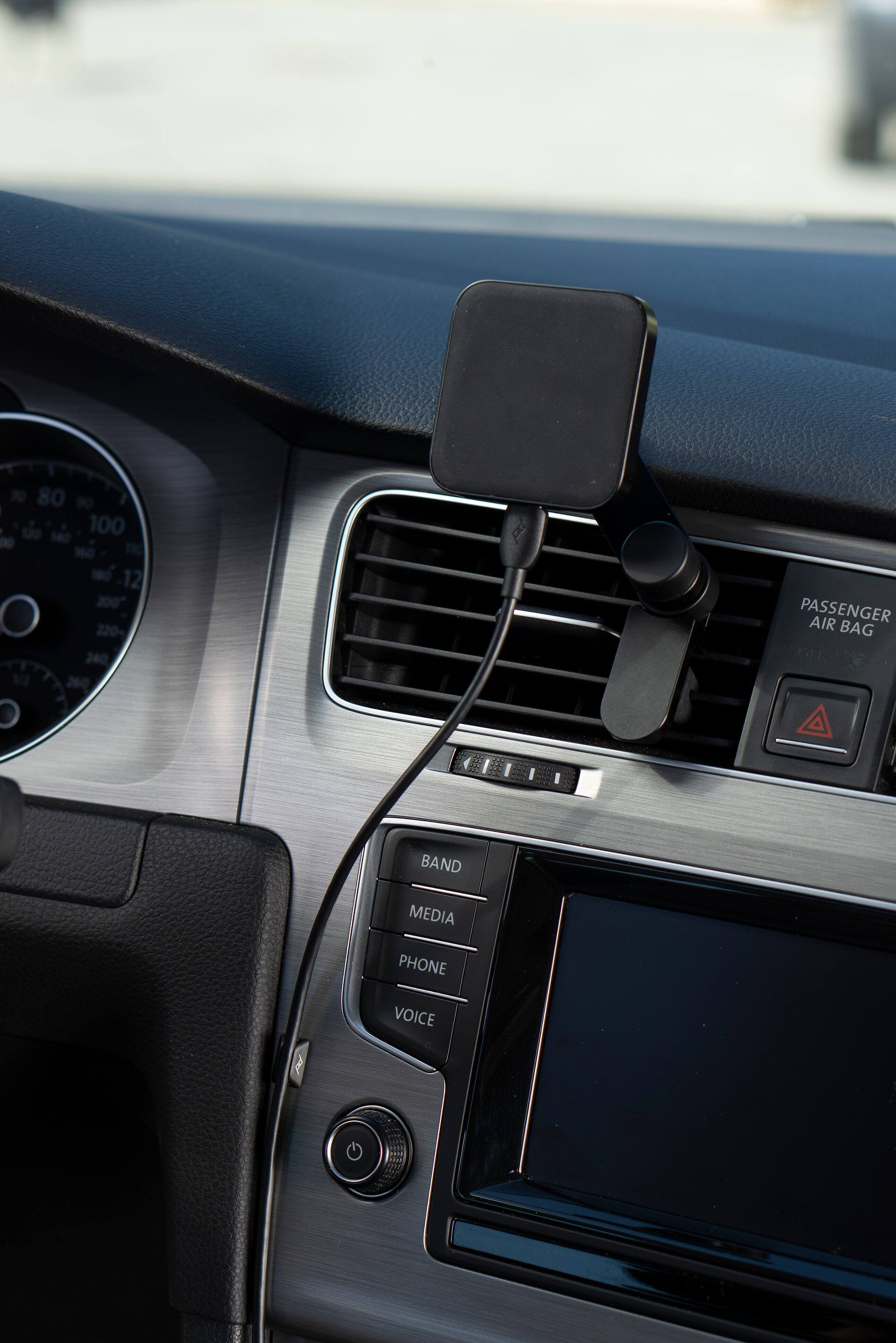 The text on the image reads: "30 80 s0 120 100 DO 1e0 NO T 180 12 200 120 240 12 260 PASSENGER AIR BAG BAND MEDIA PHONE VOICE." However, it is not clear what the text represents or its significance. It could be a code, a description of the car's features, or a combination of both.