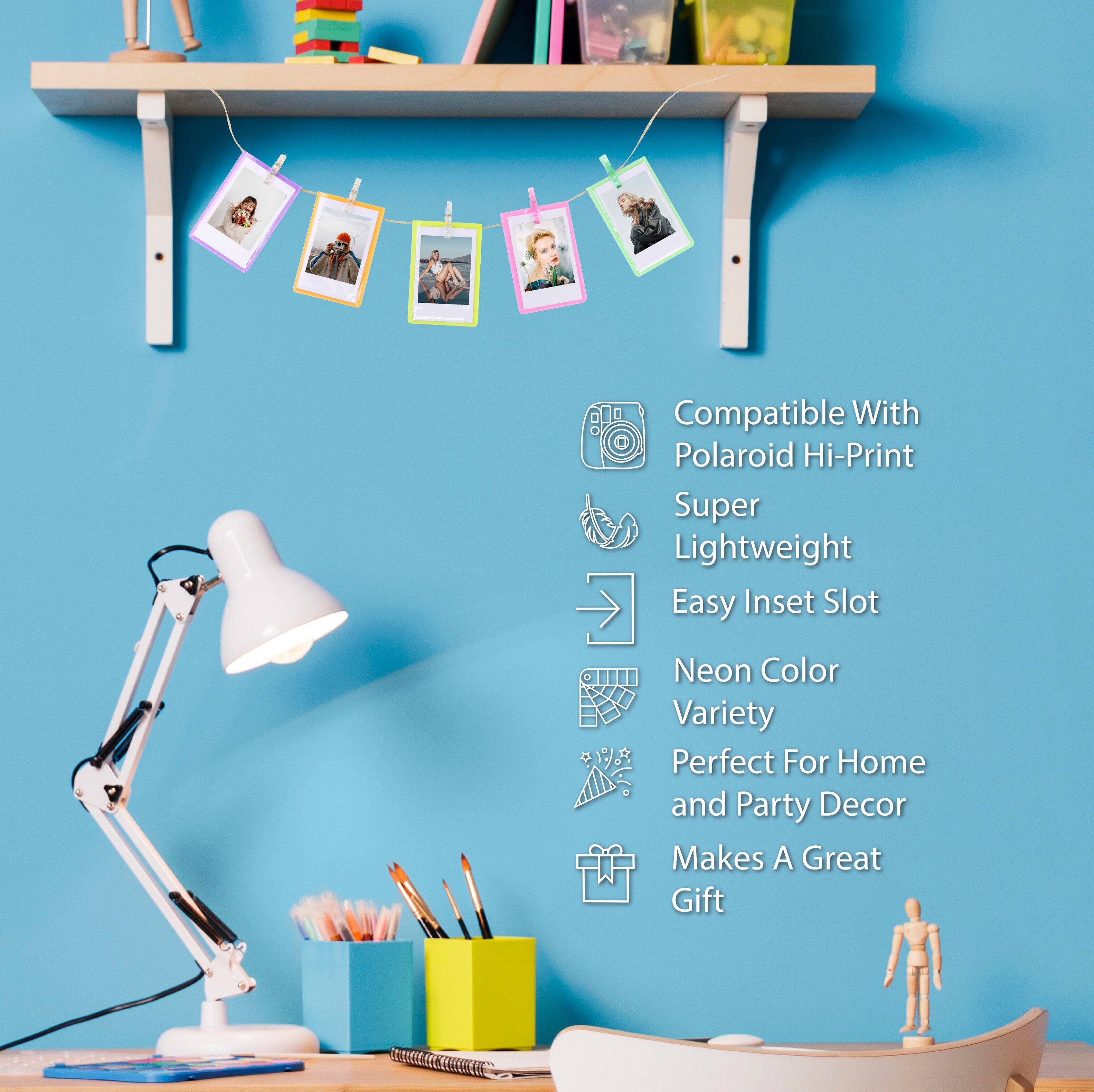 Compatible With Polaroid Hi-Print  
Super Lightweight  
Easy Inset Slot  
Neon Color Variety  
Perfect For Home and Party Decor  
Makes A Great Gift