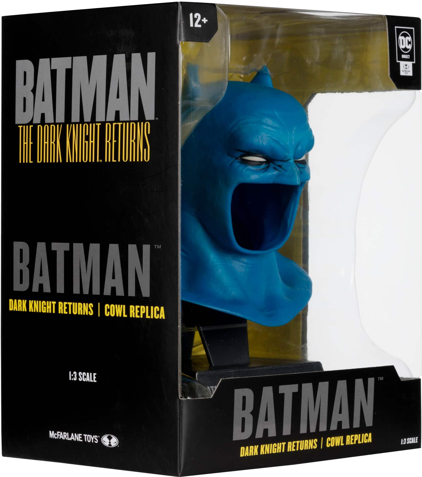The text on the image reads: "BATMAN DARK KNIGHT RETURNS | COWL REPLICA 1:3 SCALE McFARLANE TOYS TM BATMAN COWL REPLICA 1:3 SCALE KNIGHT RETURNS | DARK."