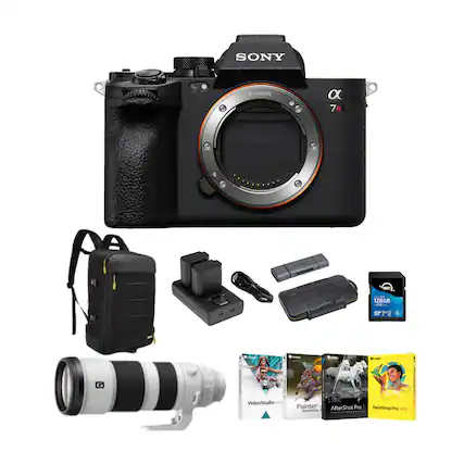 Sony 2 E-mount a 7R camera with a 12BGB memory card, a KOAH bag, a strap, and a charger are displayed. In addition, there are several books and a backpack, which may be related to photography or travel.