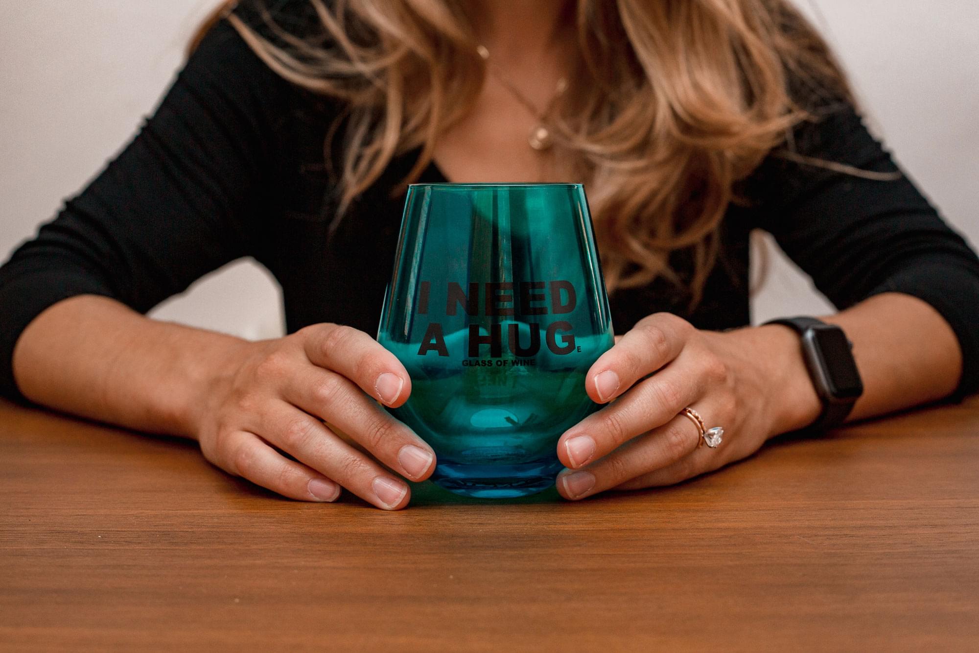 I NEED A HUG. A GLASS OF WINE.