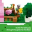 Guide the baby pig through the gate into the field.