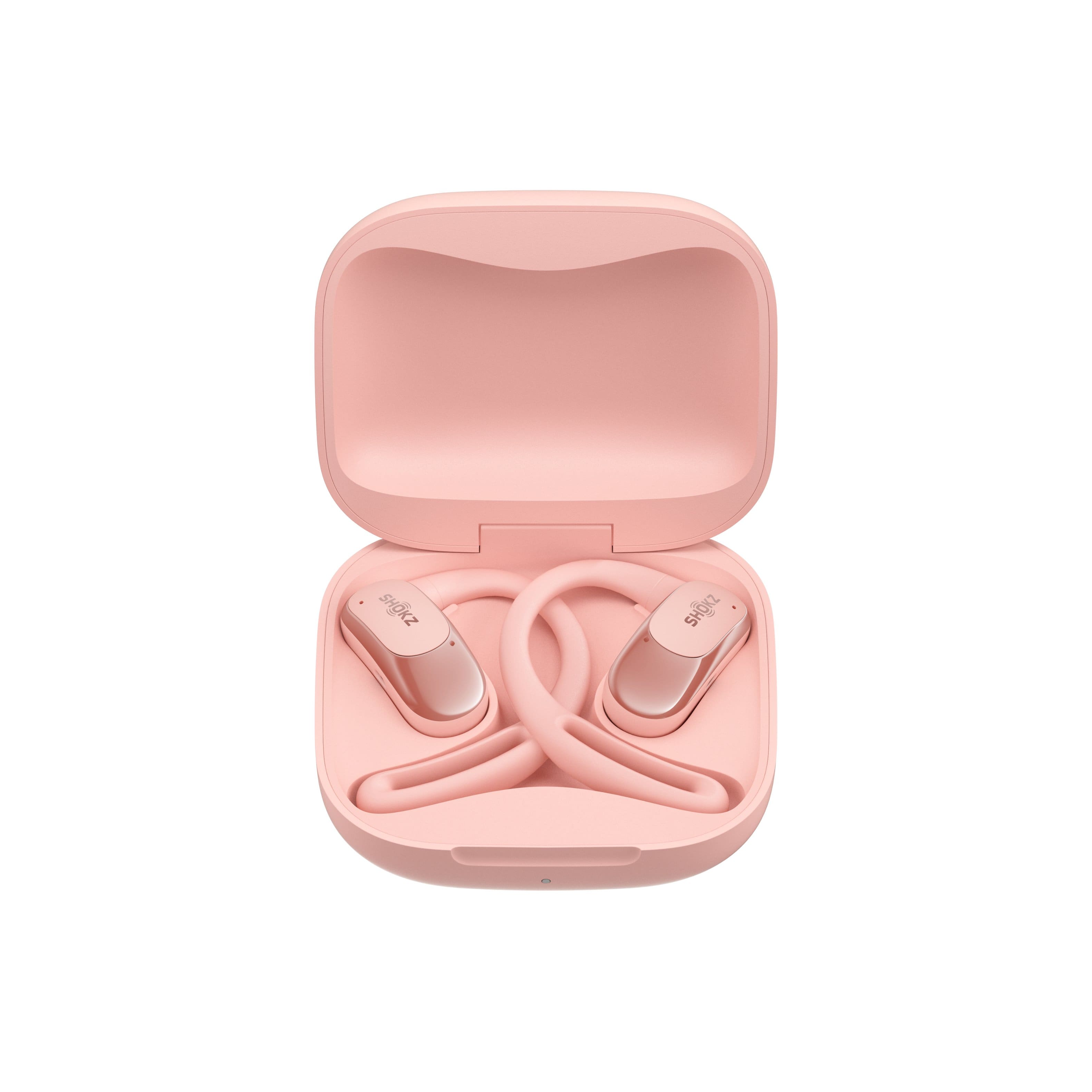 The image features a pink case with earbuds inside. The case is open, revealing the earbuds, which are white and pink in color. The earbuds are placed inside the case, which is designed to protect and store them when not in use. The case is a compact and convenient way to carry the earbuds around, ensuring they remain safe and clean.