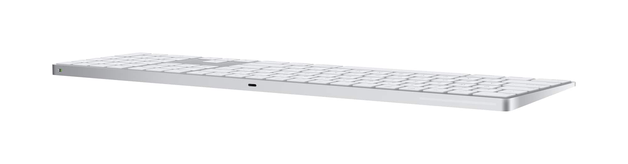 Left. Apple - Magic Keyboard full size with Numeric Keypad (Lightning Port) - Silver/White.