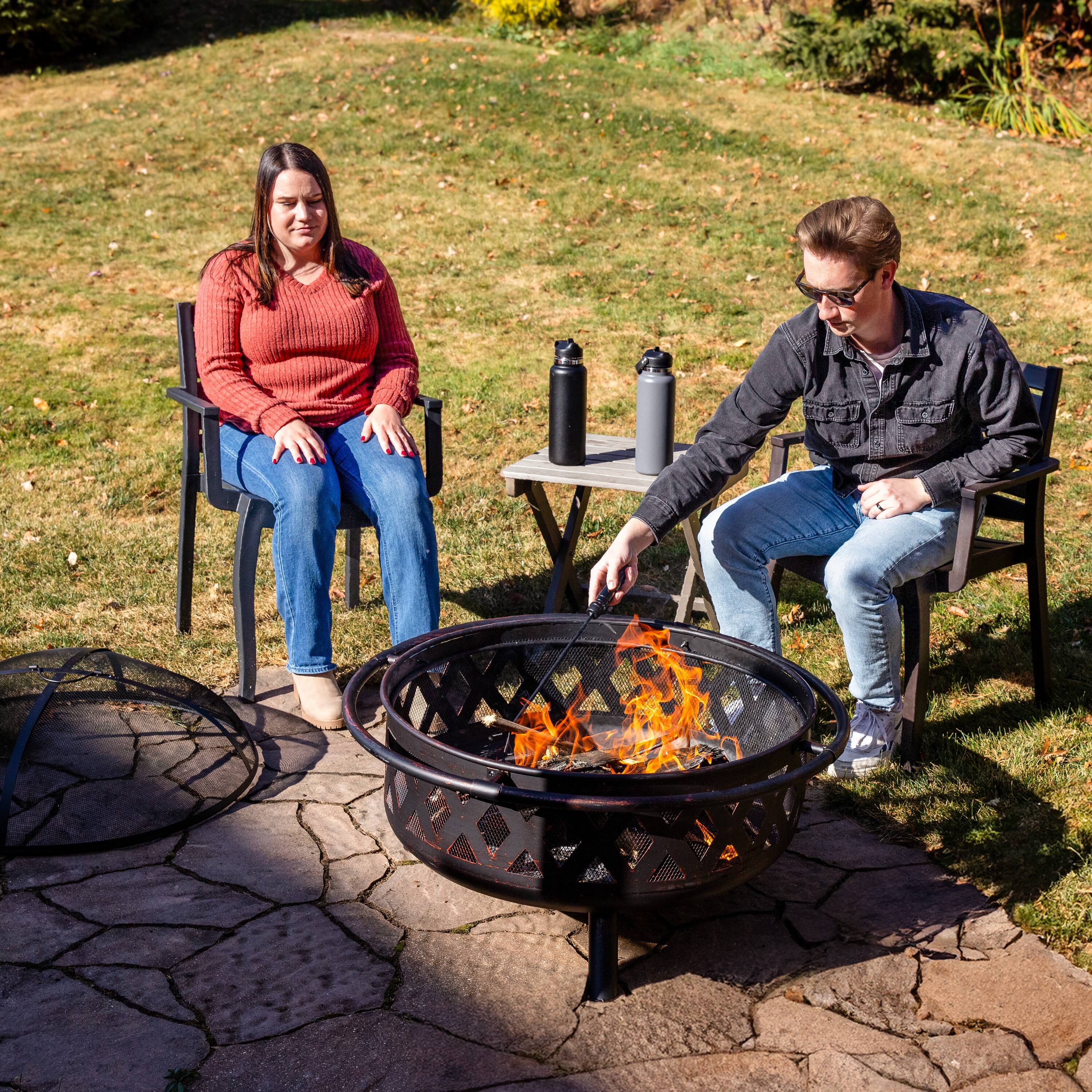 Alt View 9. Sunnydaze - 36 in Crossweave Steel Fire Pit with Screen and Poker - Bronze.