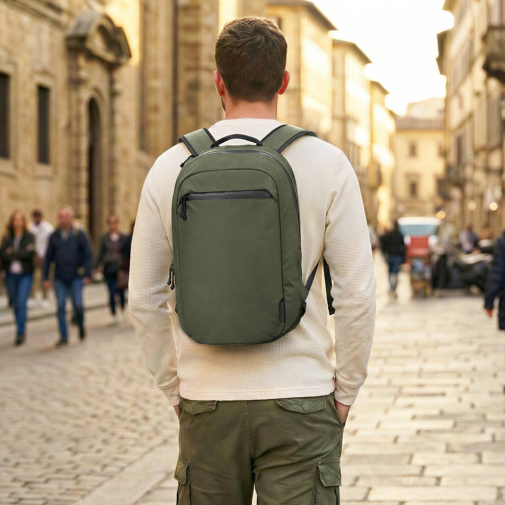 Angle. ALPAKA - Essential Backpack 16L Laptop Backpack for Up to 16" Laptops with Water Bottle Holder and Water-Resistant Design - Green.