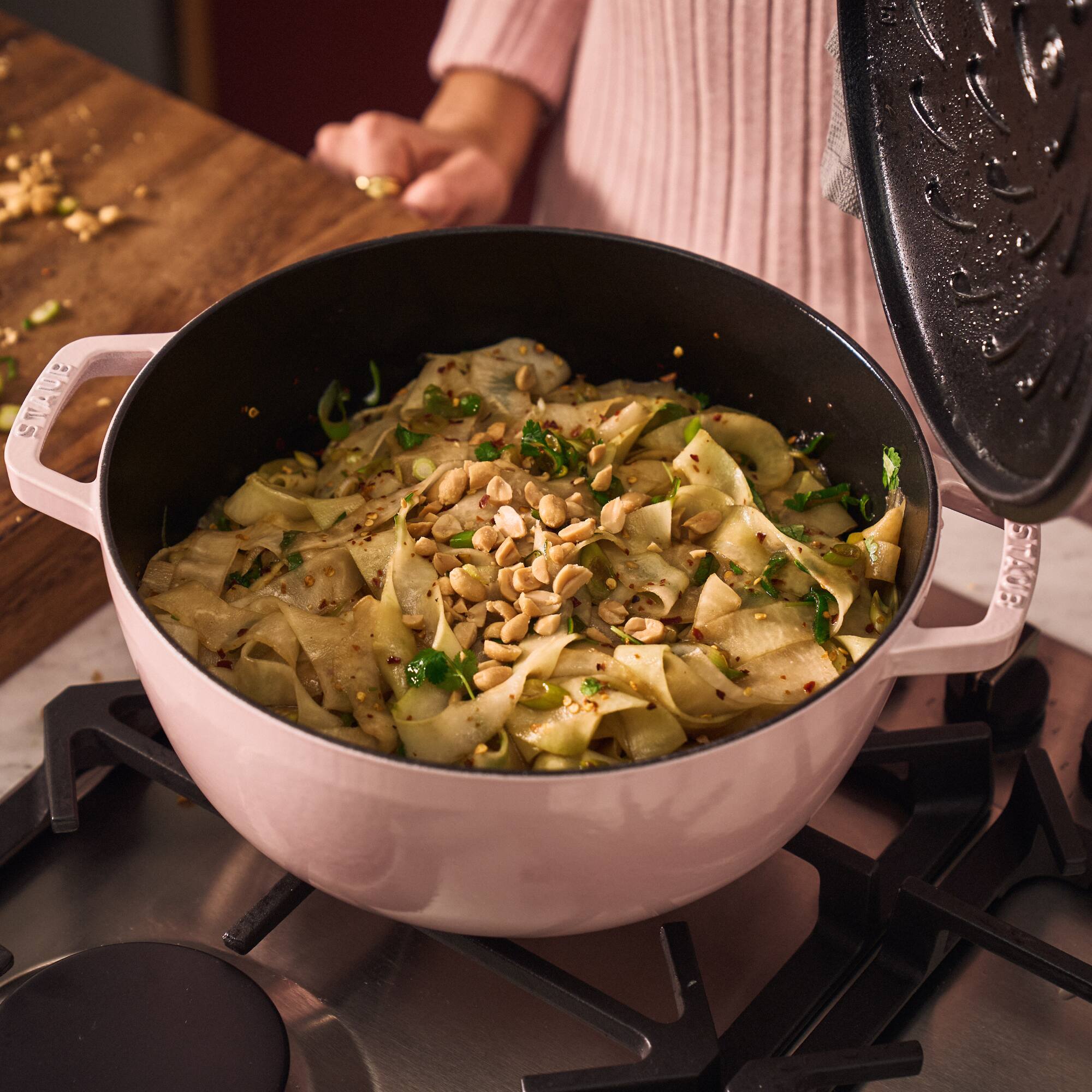 Alt View 4. Staub - Staub Cast Iron Essential French Oven, Dutch Oven, 5-quart, serves 5-6, Made in France - Peony Pink - Pink Peony.