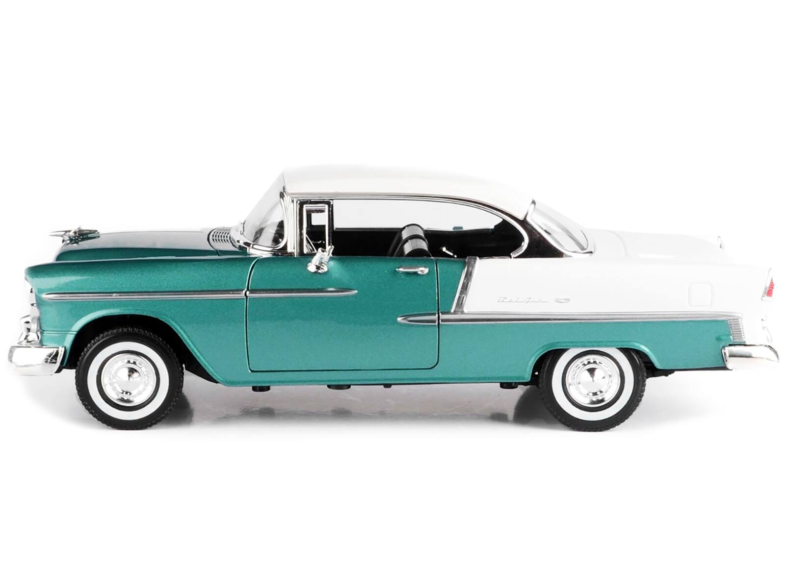 Angle. Motormax - 1955 Chevrolet Bel Air Hard Top Green Metallic and White 1/18 Diecast Model Car by Motormax - Green.