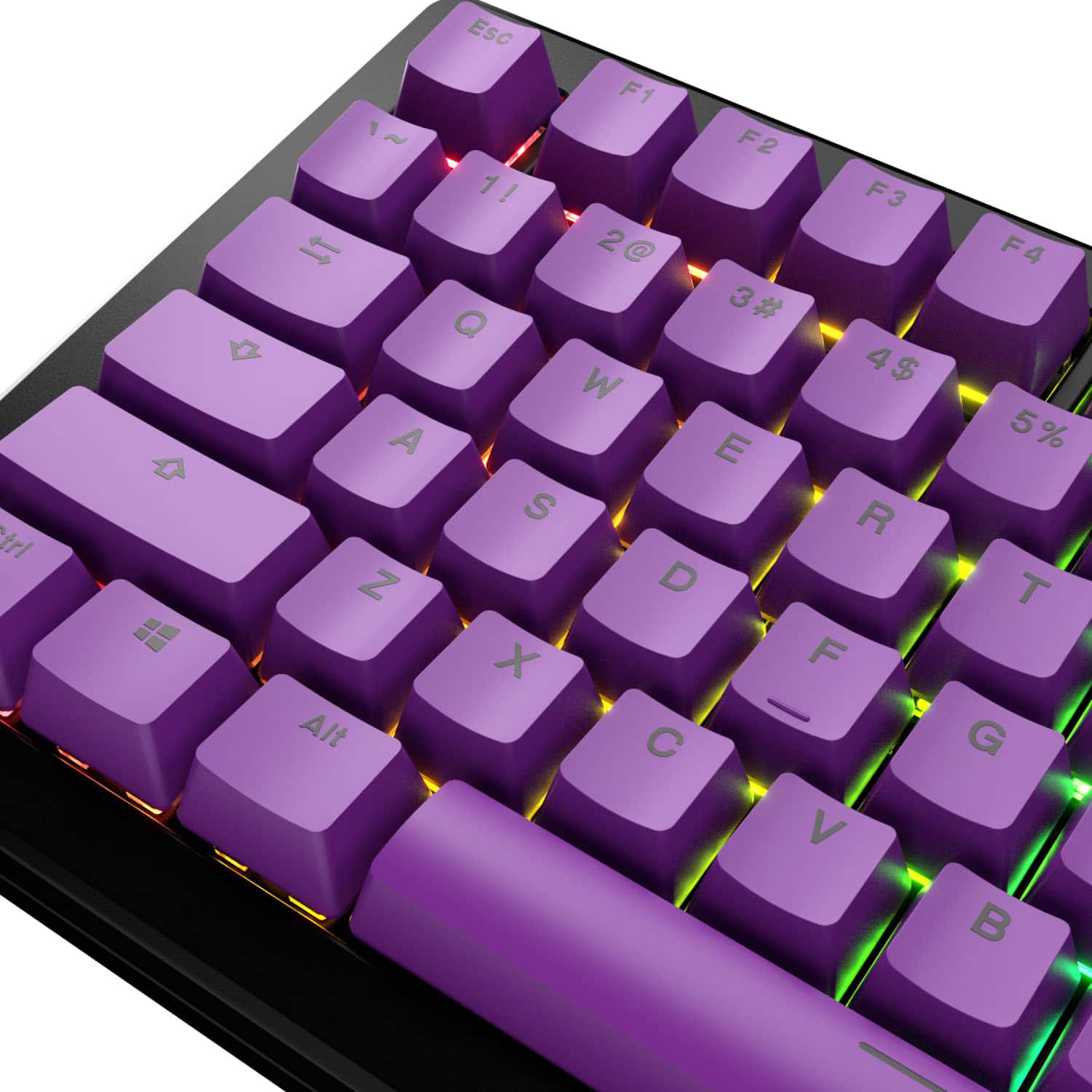 The image shows a purple keyboard with a colorful design. The keys are labeled with numbers and letters, including the numbers 1 to 9, the letters A to Z, and the symbols @, Q, W, E, R, T, Y, U, I, O, P, J, K, L, and the exclamation mark (!). The keyboard also features a number pad and a function key row with the F1 to F12 keys. The colorful design adds a unique and visually appealing touch to the keyboard.