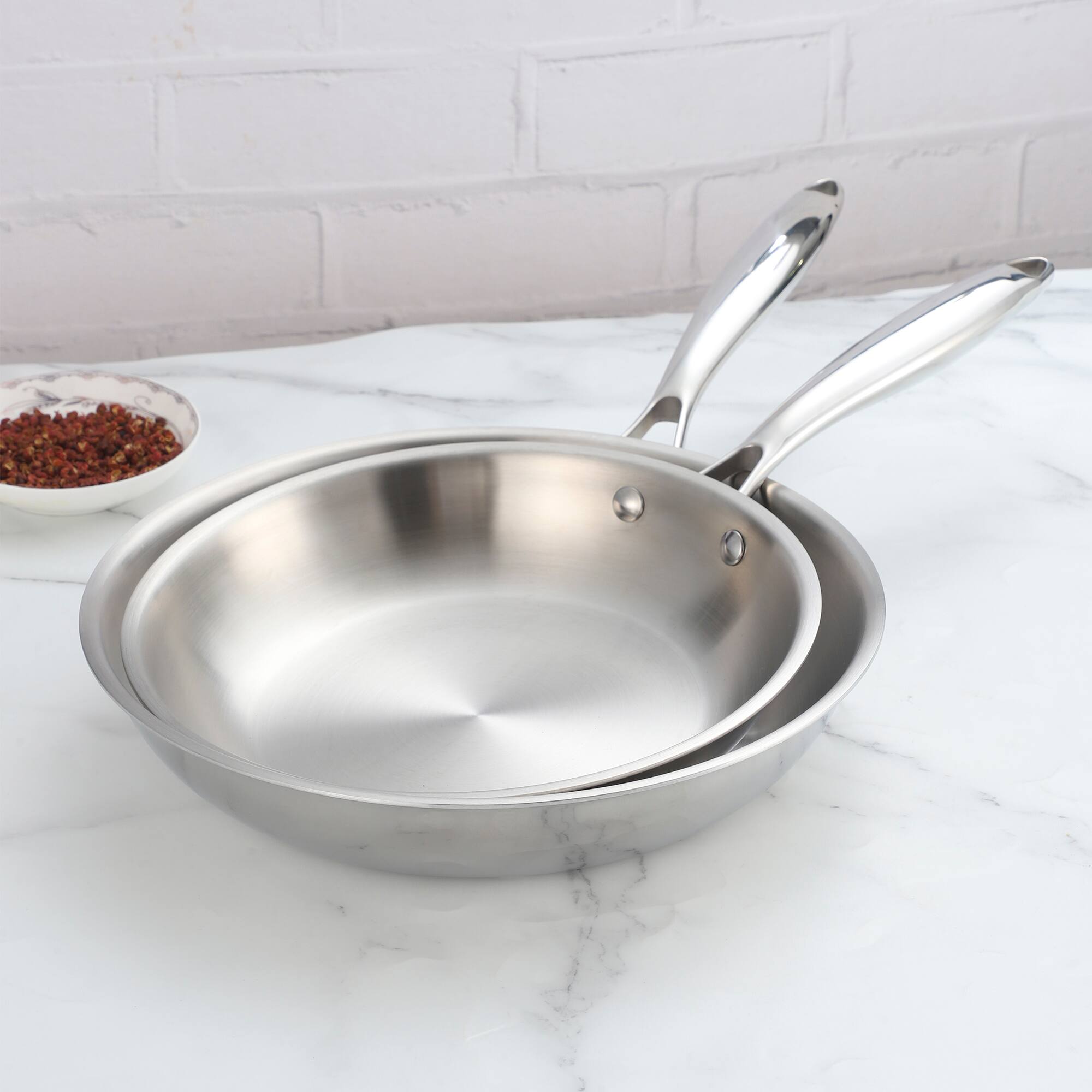 Angle. Sugift - 9.5" and 11" Tri-Ply Stainless Steel Nonstick Open Fry Pan with Premium Magnetic Stainless Exterior, Aluminum Core - Silver.