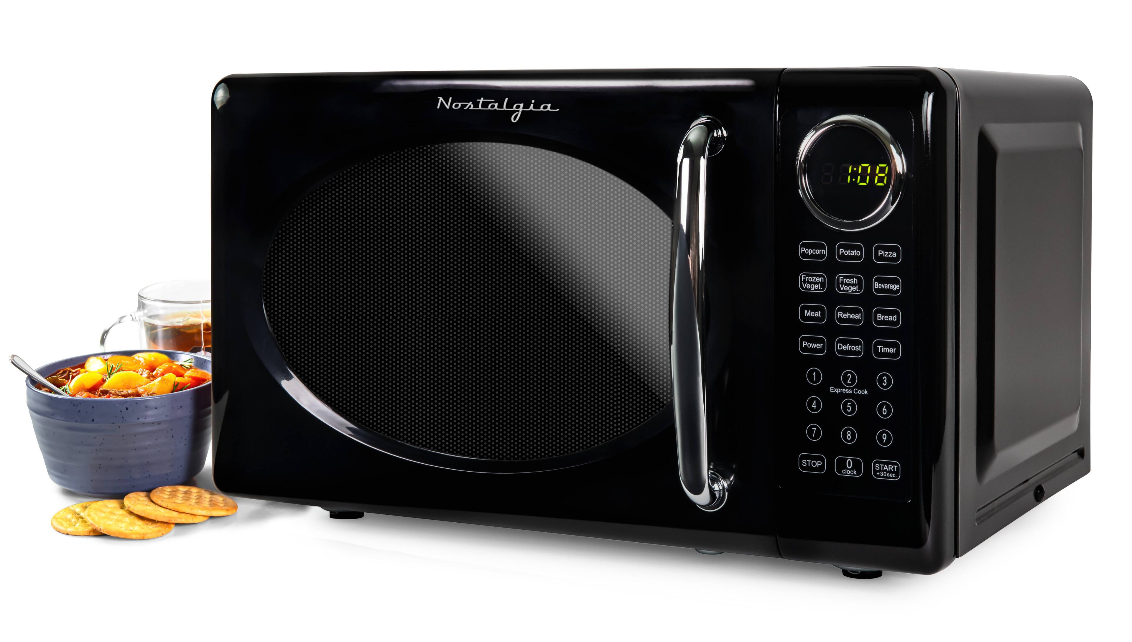 Nostalgia Nosta 88:08  
Popcorn Potato Pizza Frozen Veget Fresh Veget Beverage Meat Reheat Bread Power Defrost Timer 1 4 2 Express Cook 5 3 6 7 E 9 STOP 0 clock START . 30