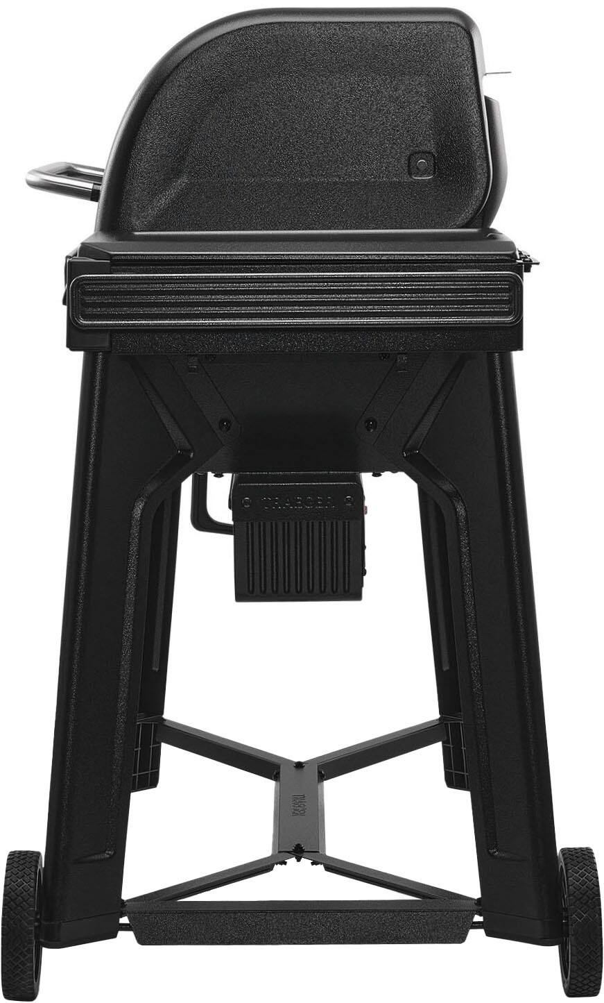 Traeger is a brand of grill, and the image shows a black Traeger grill with a black lid.