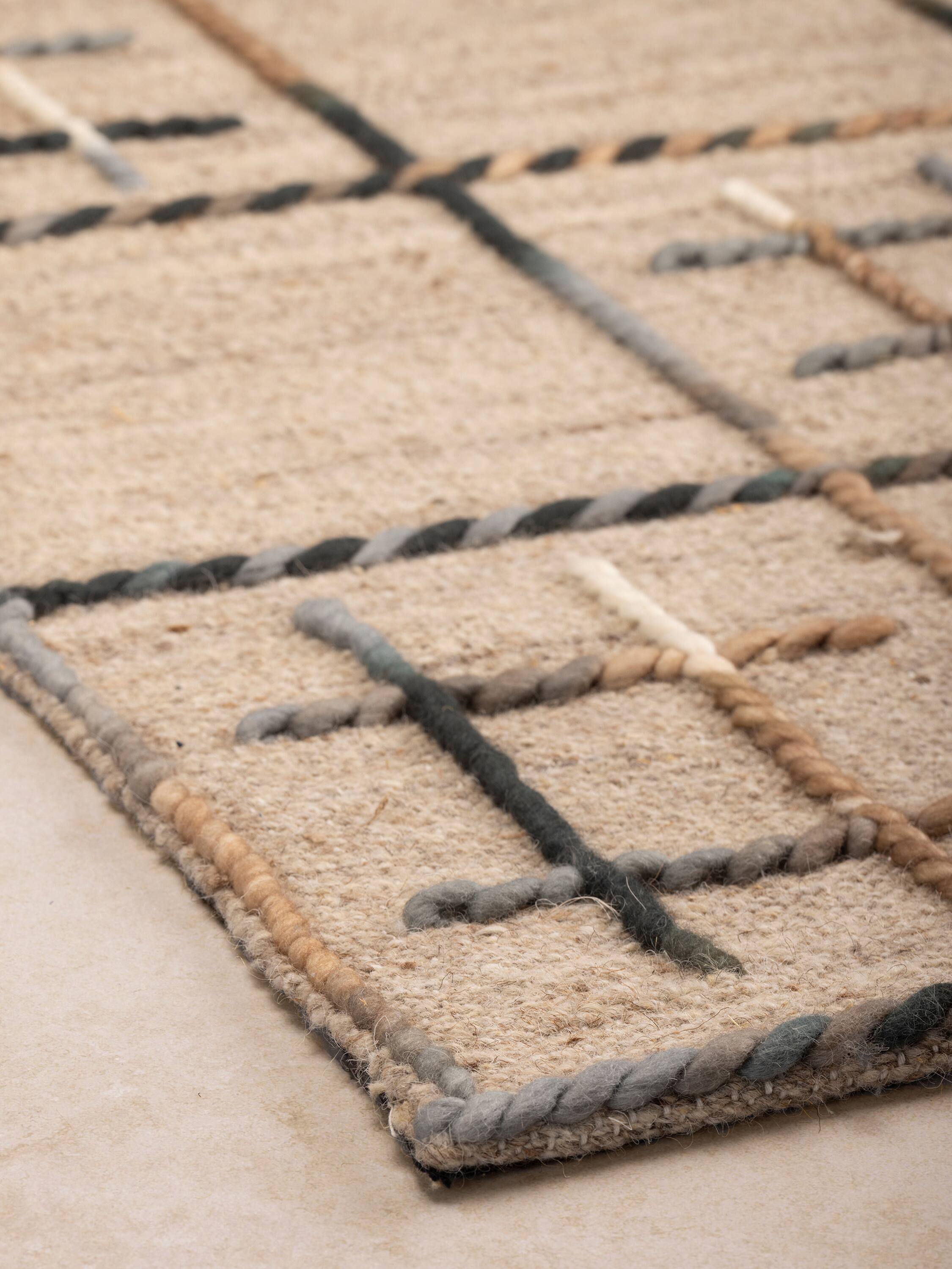 Back. GAURI KOHLI - Gilbert Rug - Shades of brown and gray.