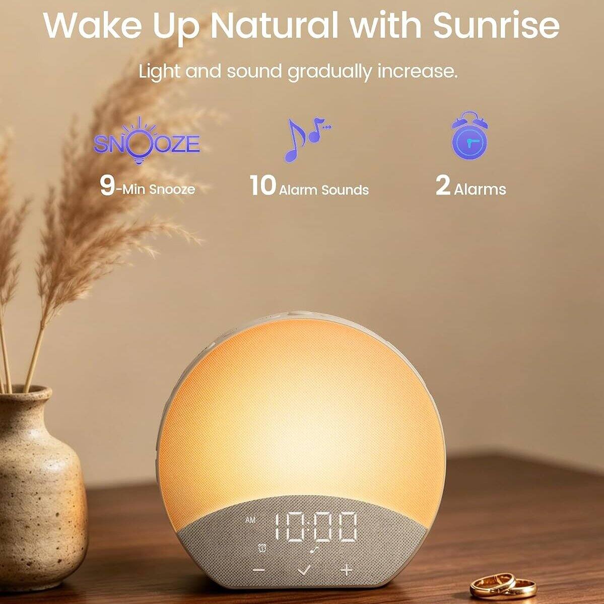 Wake Up Natural with Sunrise  
Light and sound gradually increase.  

SNOOZE  
9-Min Snooze  

10 Alarm Sounds  

2 Alarms