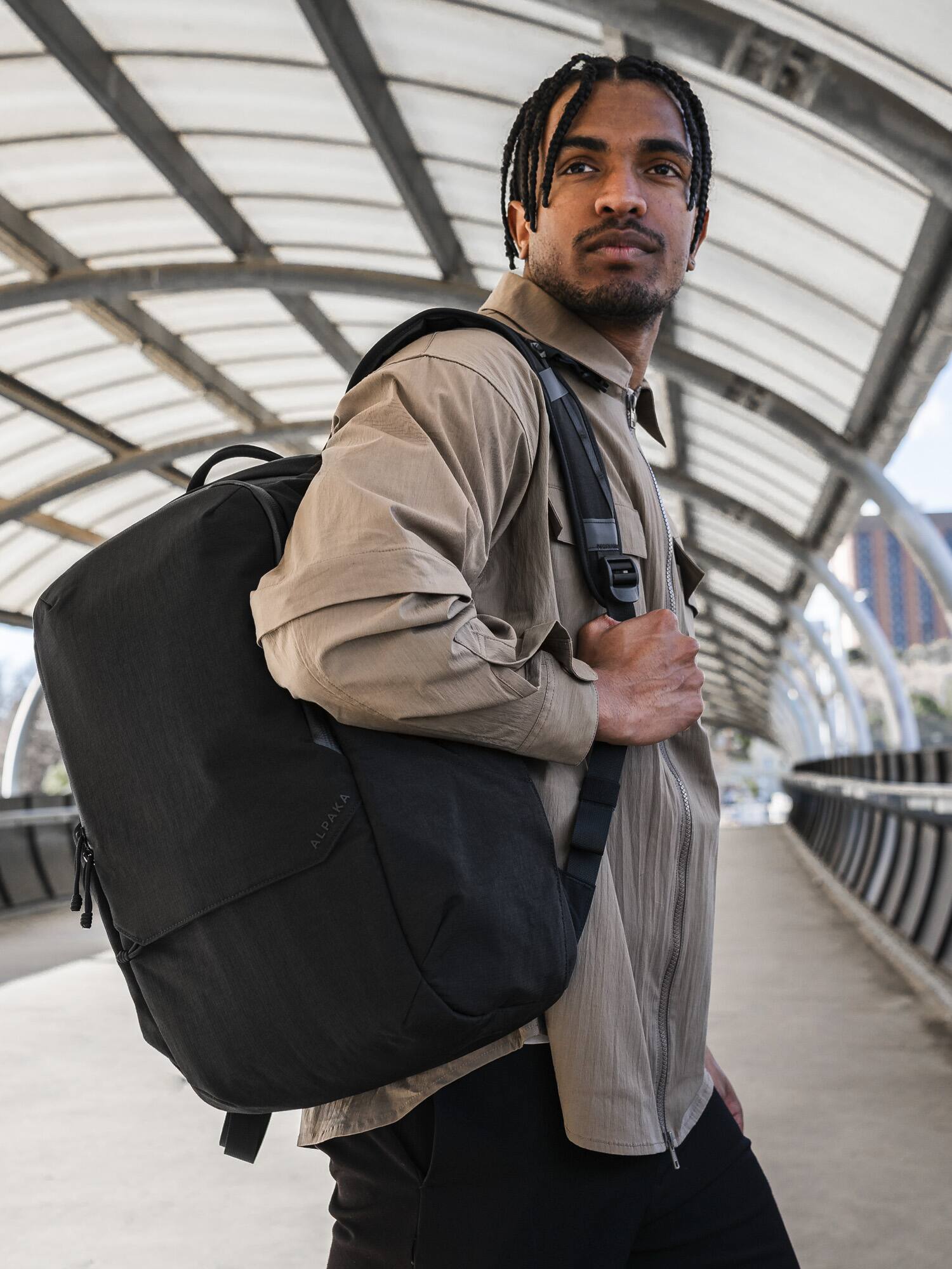 Angle. ALPAKA - Elements Backpack Pro Laptop Backpack Fits 16'' Laptop with Dual Bottle Pockets, Travel Backpack for Men - Black Axoflux 400D Ripstop Nylon.