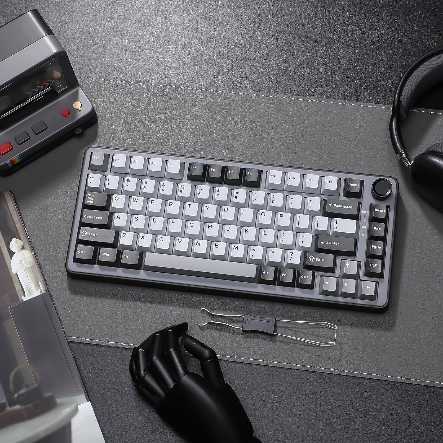 The text in the image appears to be a mix of keyboard keys and other characters. Here's a corrected and grouped version:

- 1 2 3 4 5 6 7 8 9 0
- Q W E R T Y U I O P
- A S D F G H J K L
- Z X C V B N M
- Caps Lock Shift
- F1 F2 F3 F4 F5 F6 F7 F8 F9 F10 F11 F12
- Win Ctrl Alt
- Backspace Enter
- Insert Delete
- Home End Page Up Page Down
- Scroll Lock
- Num Lock
- Print Screen
- Pause Break

This represents the layout of a standard keyboard.