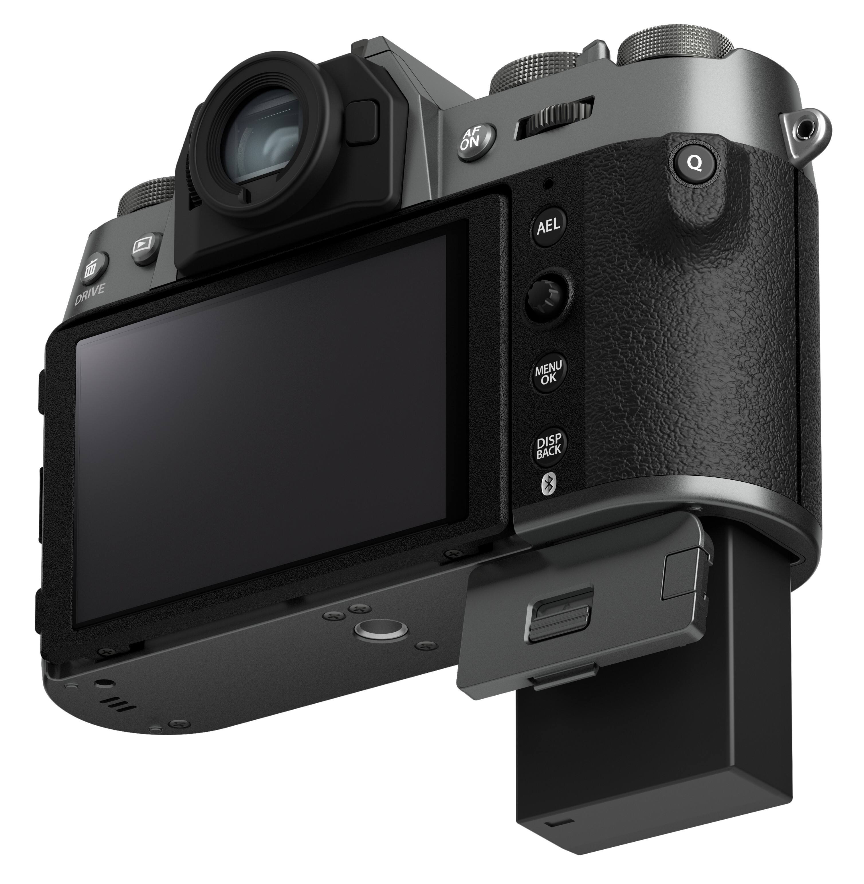 The image features a digital camera with a large screen and a viewfinder. The camera has a black and silver color scheme, and it is equipped with a memory card slot. The camera also has a display screen and a viewfinder, which allows the user to see the image they are capturing. The camera is designed for professional use and offers high-quality images.