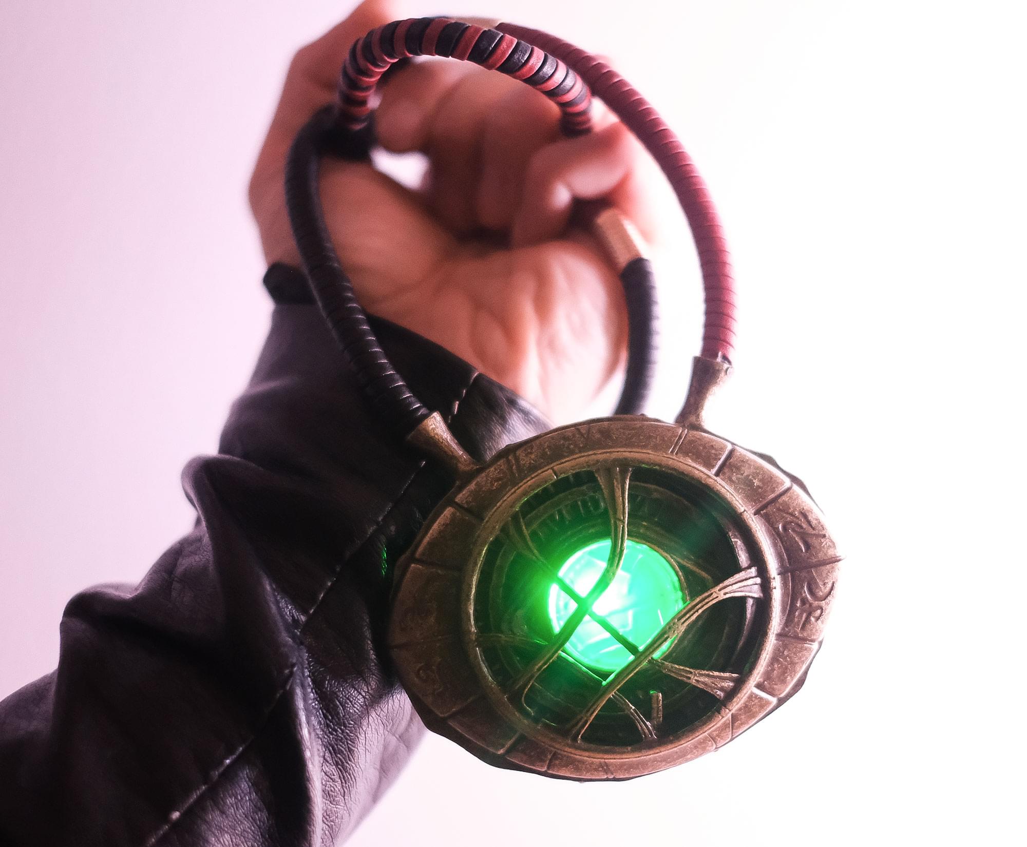 Alt View 4. SalesOne LLC - Marvel Doctor Strange Eye of Agamotto 1:1 Scale Light-Up Prop Replica Necklace - Gold.