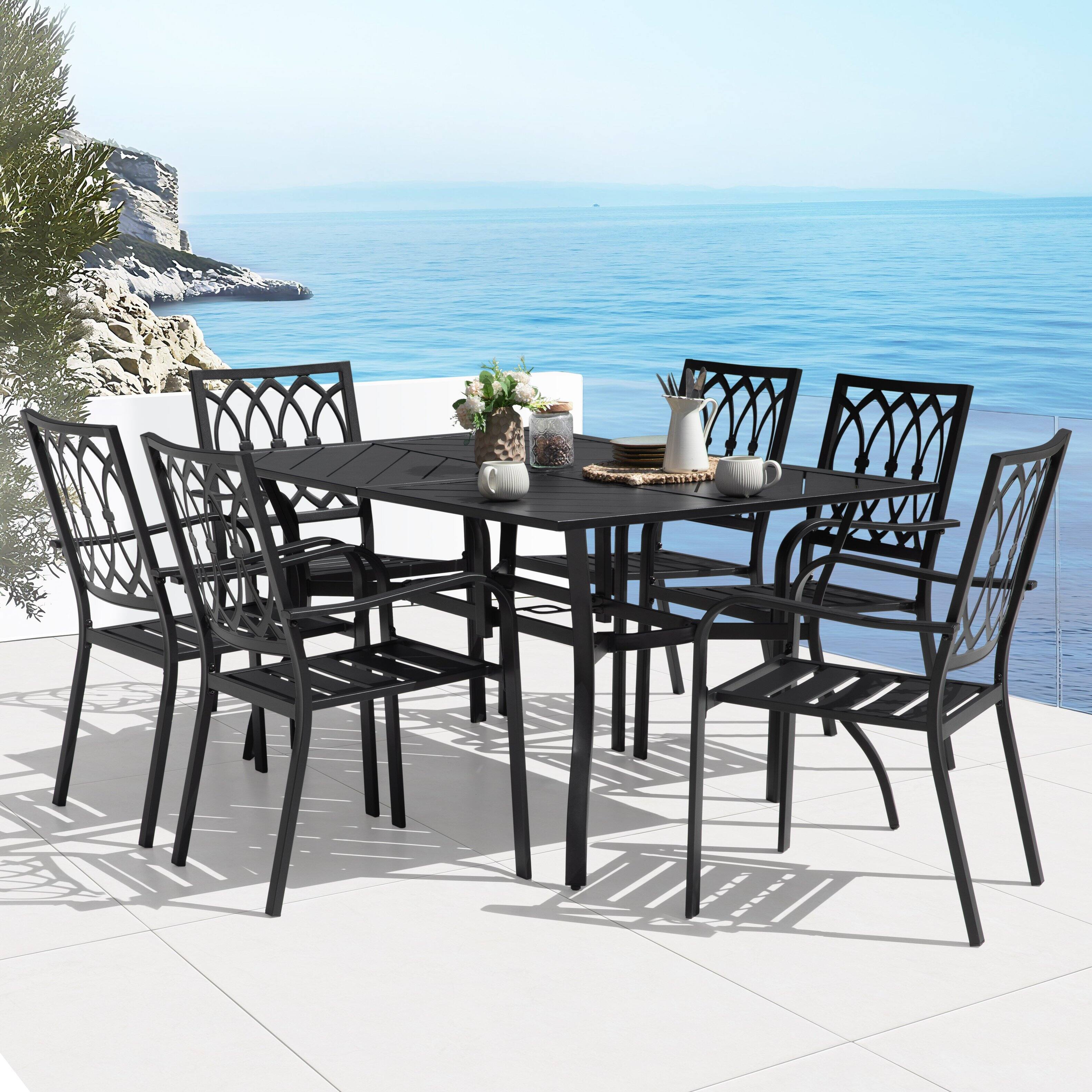 Angle. Nuu Garden - 7-Piece Metal Patio Dining Set with Umbrella Hole and 6 Stackable Chairs - Black.