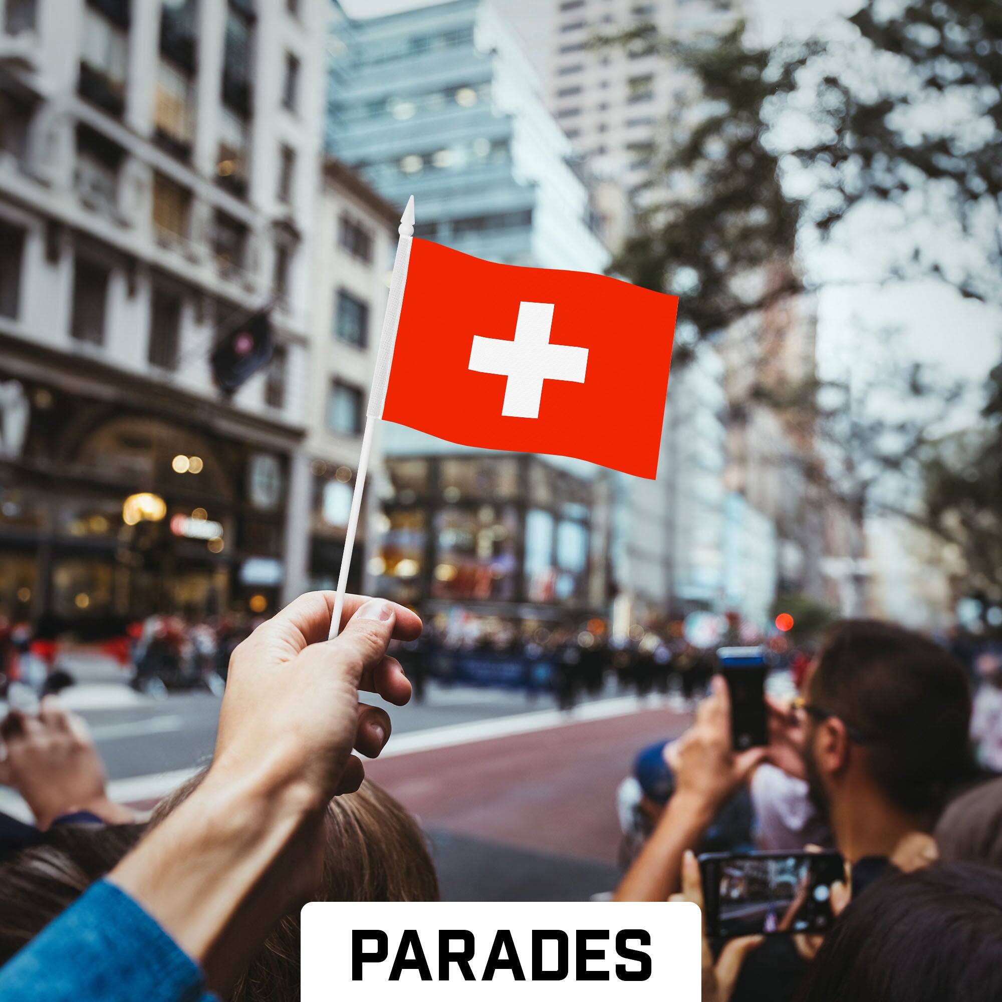 Back. G128 - 24-Pack Handheld Switzerland Stick Flags, 4 x 6 in, 150D Polyester with Plastic Spear Top. - Assorted Colors.