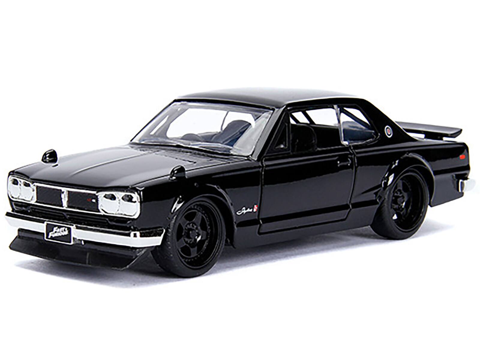 Angle. Jada - Brian's Nissan Skyline 2000 GT-R (KPGC10) Black "Fast & Furious" Movie 1/32 Diecast Model Car by Jada - Black.