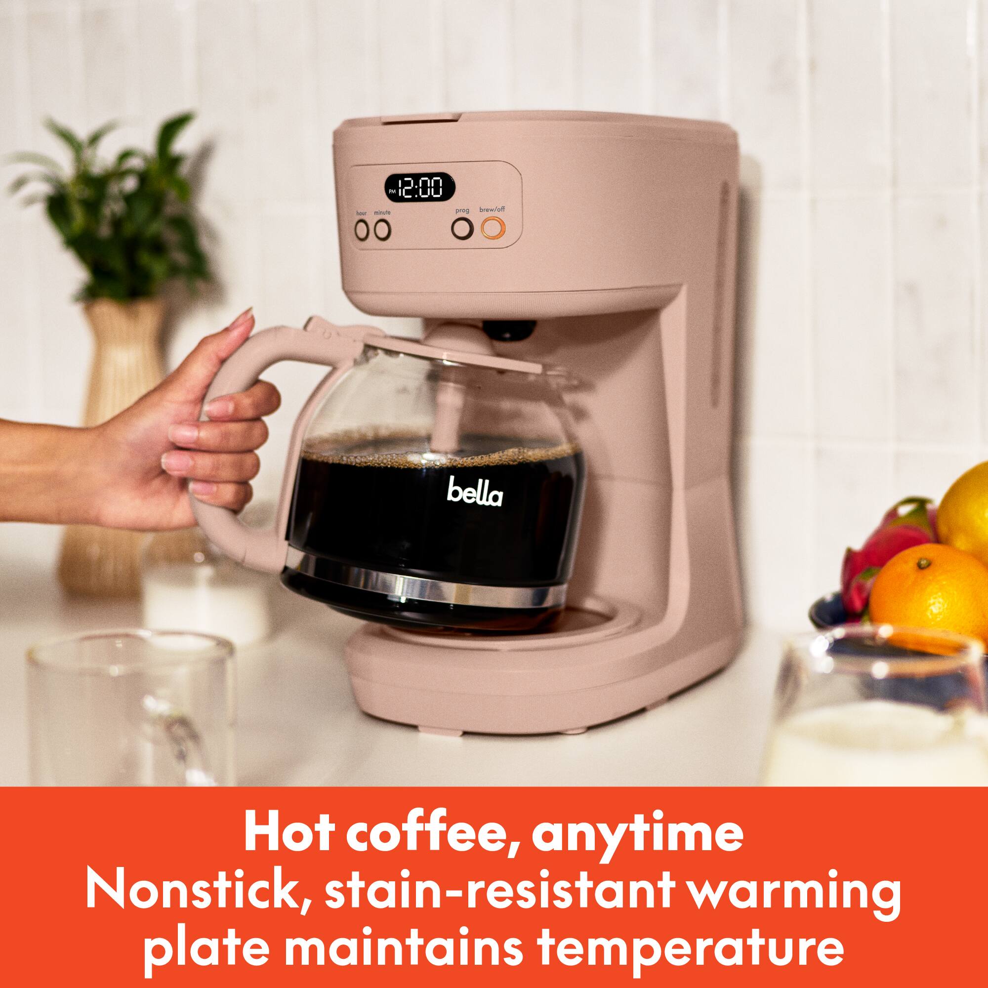 - 12:00
- E S/on
- 00
- O bella
- Hot coffee, anytime
- Nonstick, stain-resistant warming plate maintains temperature