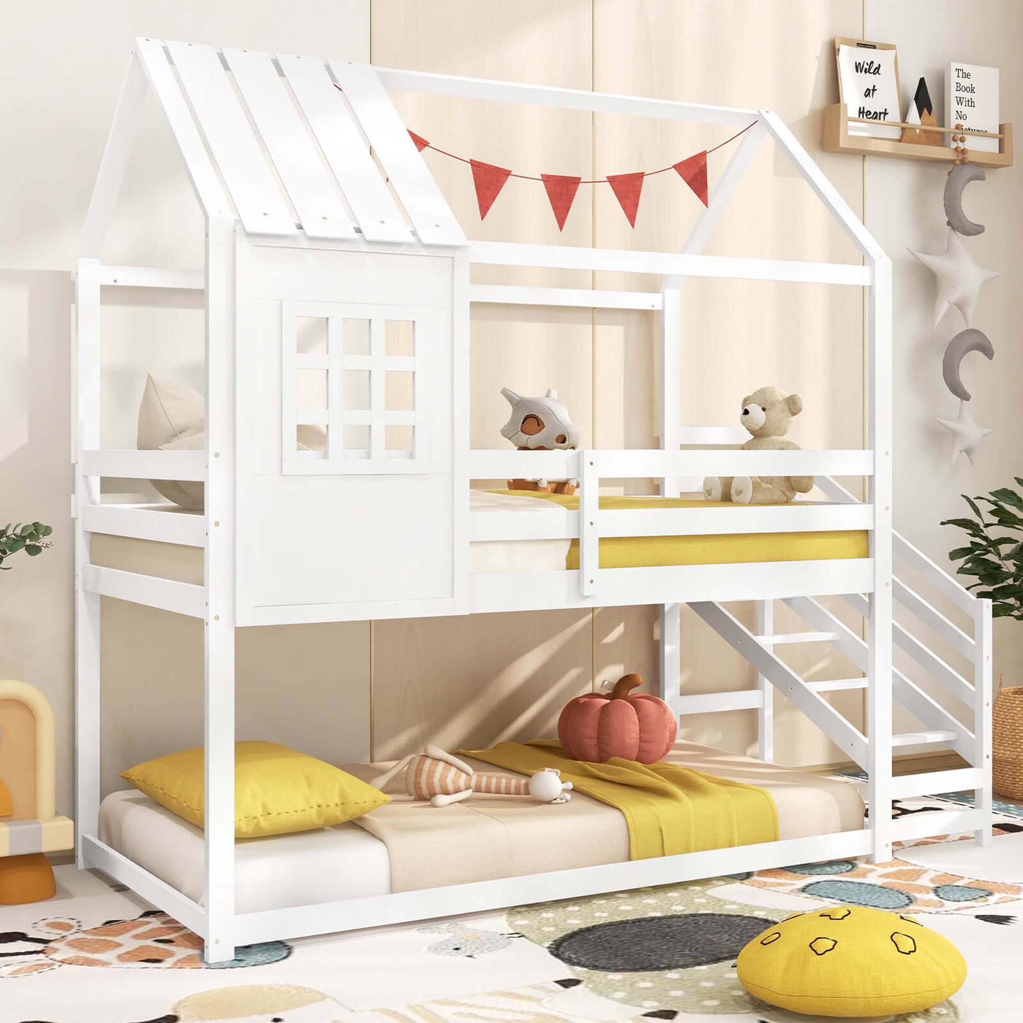 The image features a white bunk bed with a red ribbon on top. The bed has a ladder and a window, and it is situated in a room with a yellow rug. There are two teddy bears on the bed, one on the top bunk and one on the bottom bunk. The room also contains a potted plant, a chair, and a clock on the wall. The bed is designed for children and provides a comfortable and cozy sleeping area.
