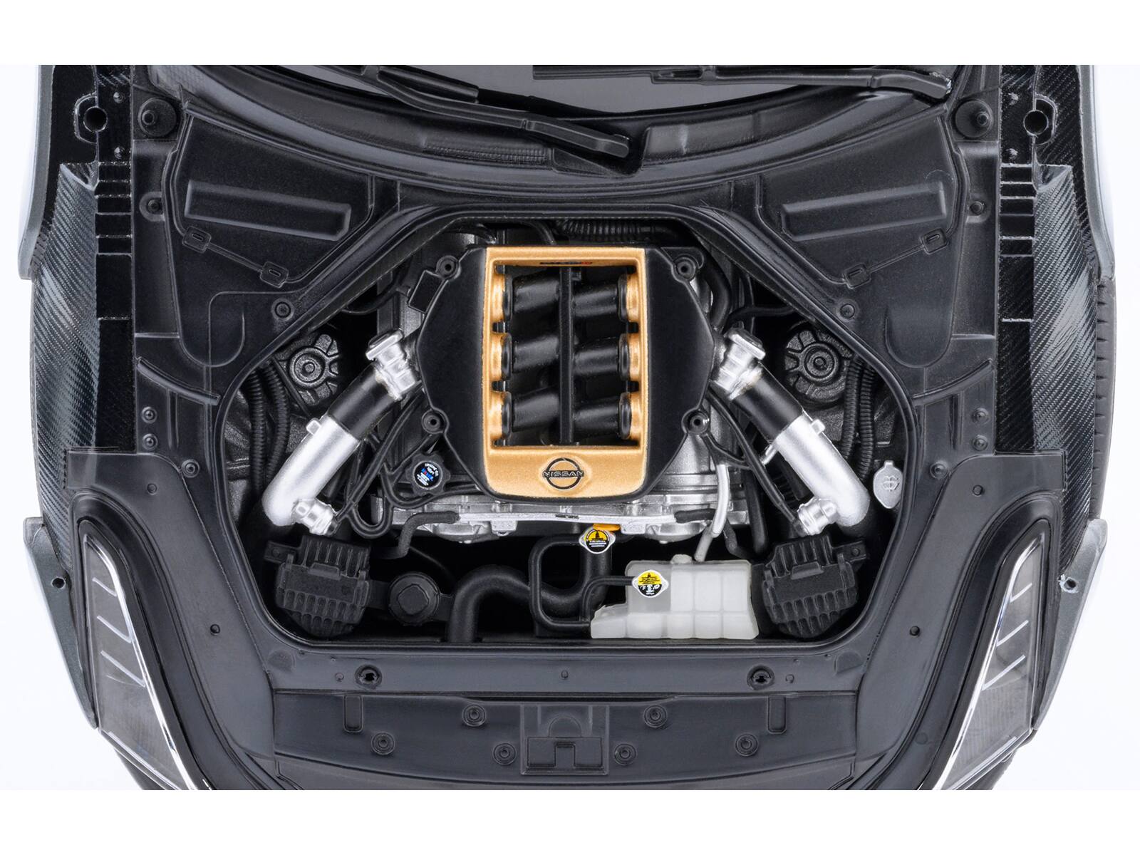 Left. Autoart - Nissan GT-R50 By ItalDesign "Goodwood Version" Liquid Kinetic Gray Metallic with Gold Accents 1/18 Model Car by Autoart - Gray Metallic.