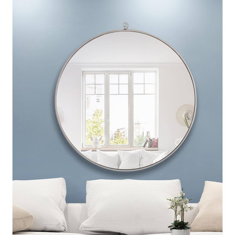 Left. Elegant Decor - Metal frame Round Mirror with decorative hook 36 inch Silver finish - Silver.