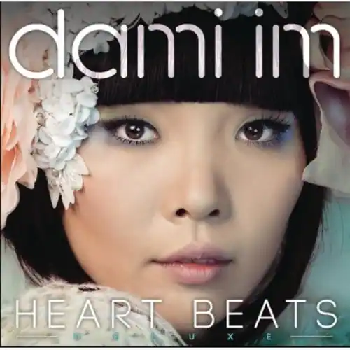 dami im  
HEART BEATS  
D A L U X E