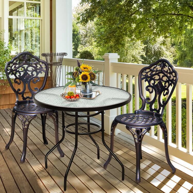 Angle. Mondawe - 32in Round Tempered Glass Patio Table w/ Umbrella Hole, Outdoor Steel Frame Side Table for Deck - Black.
