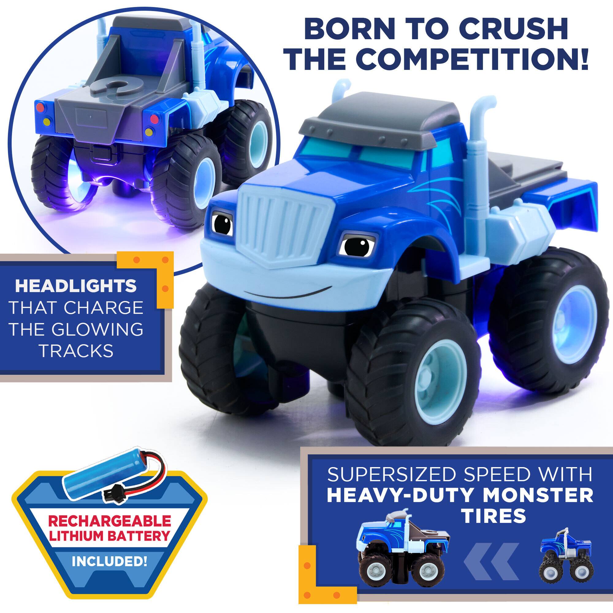 BORN TO CRUSH THE COMPETITION!  
HEADLIGHTS THAT CHARGE THE GLOWING TRACKS  
RECHARGEABLE LITHIUM BATTERY INCLUDED!  
SUPERSIZED SPEED WITH HEAVY-DUTY MONSTER TIRES