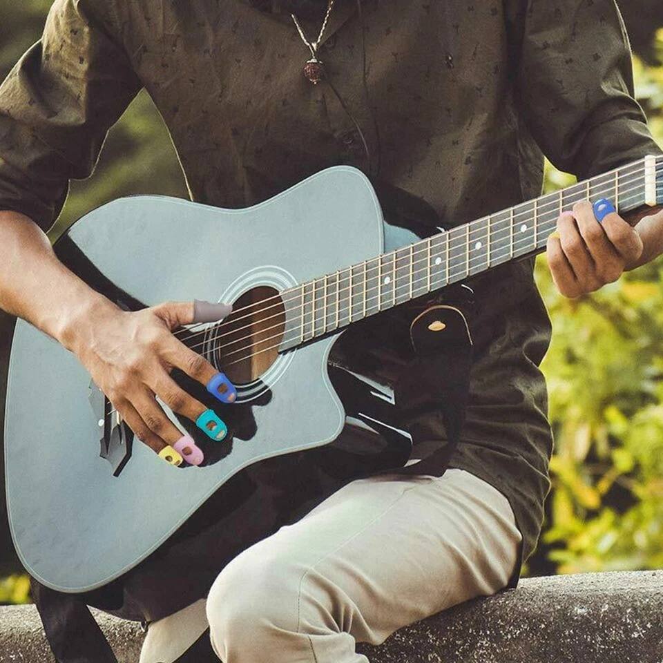 Alt View 5. Home Collection - 35pcs Guitar Silicone Finger Protector Fingertip Covers Caps + 5pcs Guitar Picks - Multi-color.
