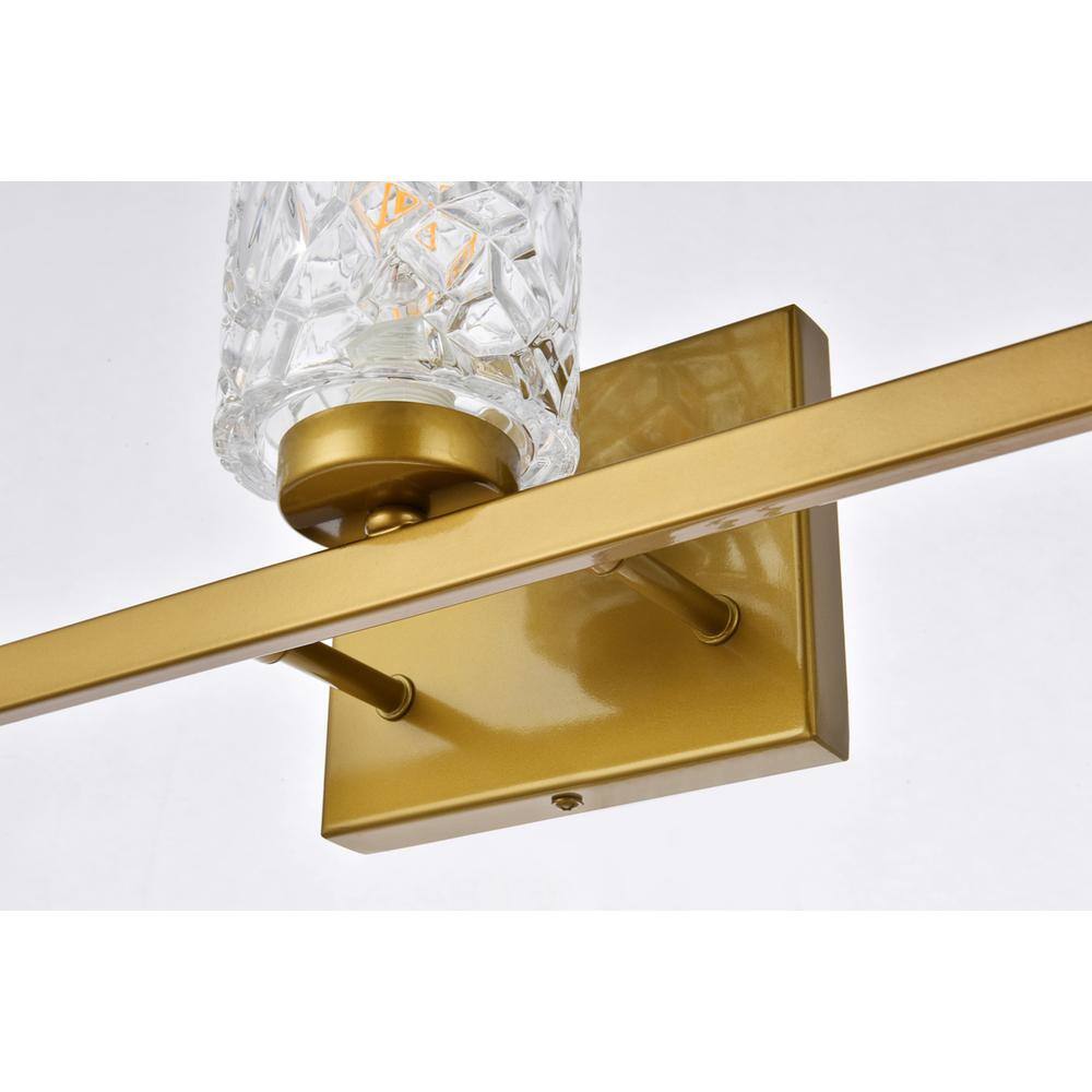 Back. Living District - Cassie 5 lights bath sconce in brass with clear shade - Brass And Clear Shade.