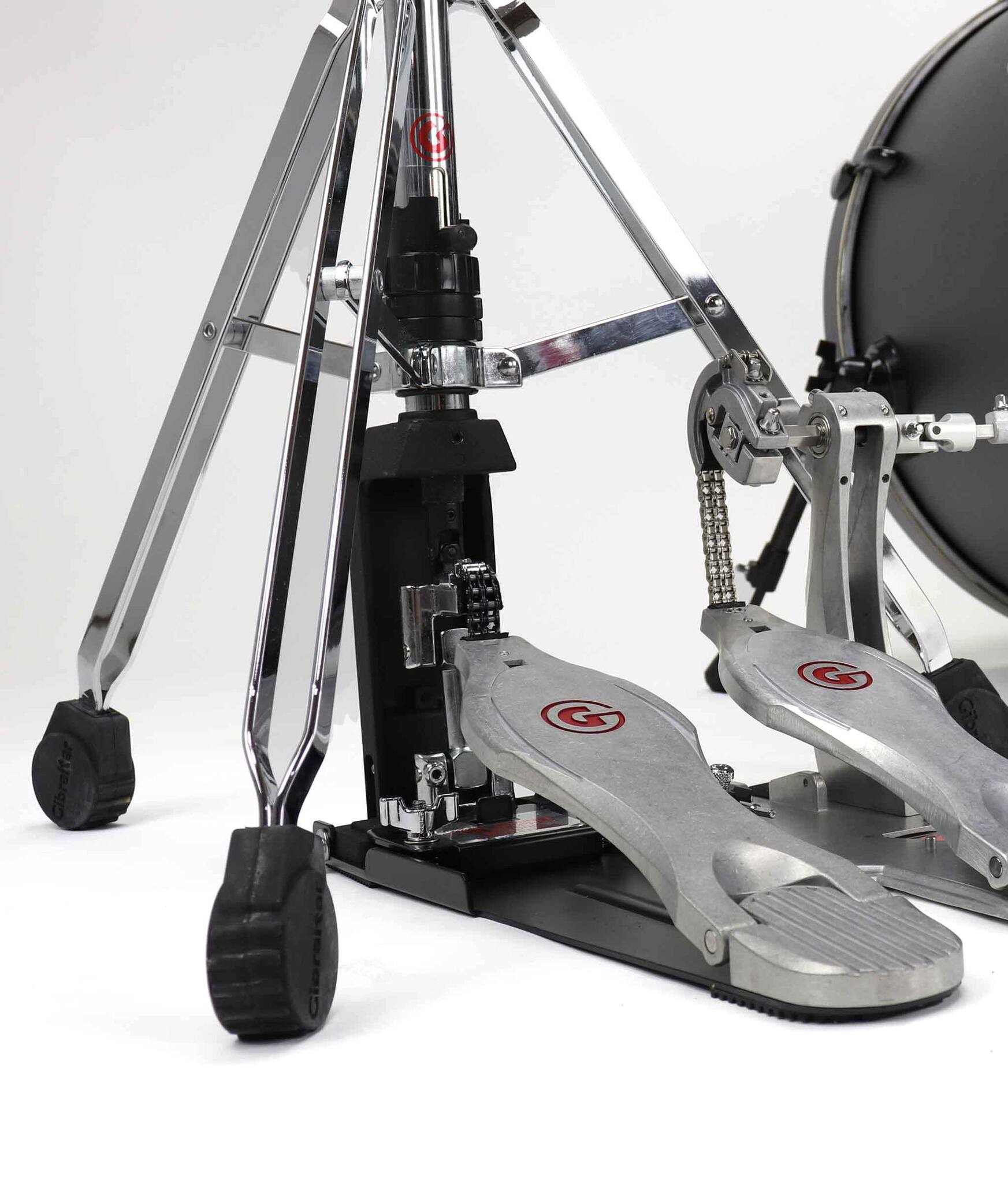 Left. Gibraltar Hardware - 9000 Series Liquid Drive Double Braced Hi Hat Stand with Super Clutch, Step Tension and Rotating Base.