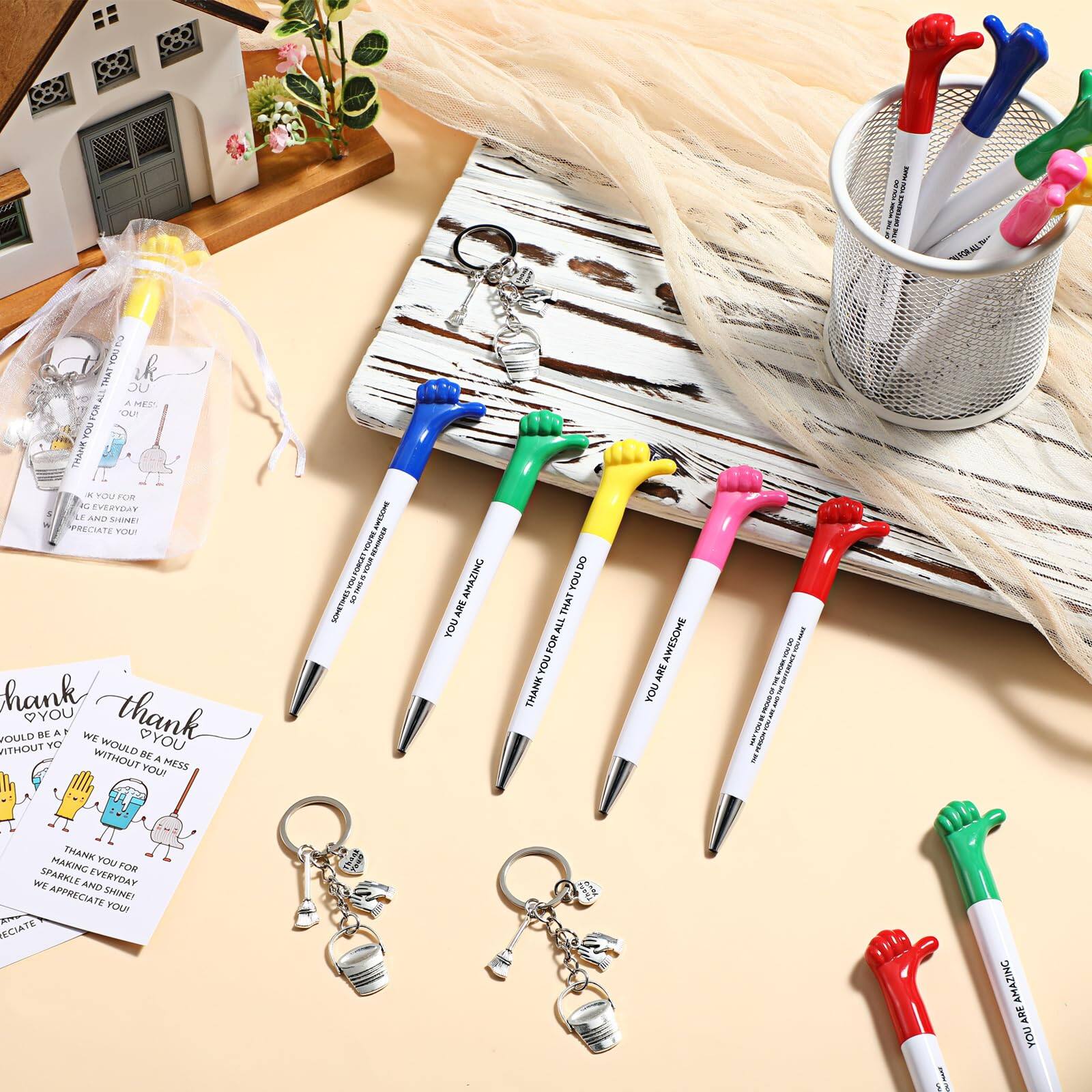 Sure, here is the corrected and grouped text from the image:

**Thank You Notes:**
- "Thank you for making everyday sparkle and shine! We appreciate you!"
- "We would be a mess without you! Thank you for shining everyday! We appreciate you!"

**Pens:**
- "Thank you for being awesome!"
- "You are amazing!"

**Other Text:**
- "Thank you for being a mess without you!"
- "We would be a mess without you! Thank you for shining everyday! We appreciate you!"