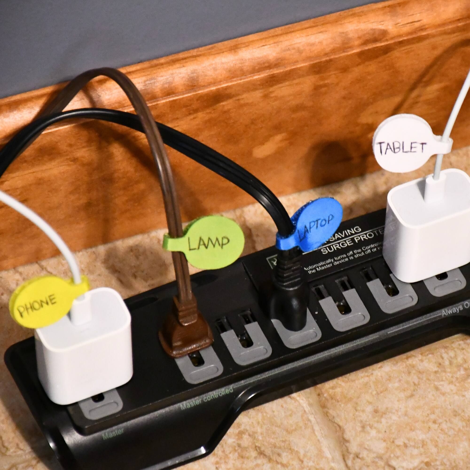 TABLET LAPTOP SAVING PROTE LAMP SURGE the Control of ER F Of s turns e A Automatically device the Master PHONE O US controlled Always Master Master