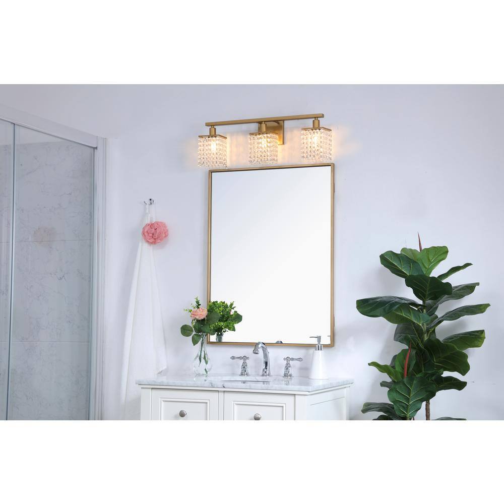 Angle. Living District - Phineas 3 light Brass and Clear Crystals wall sconce - Brass And Clear Crystals.