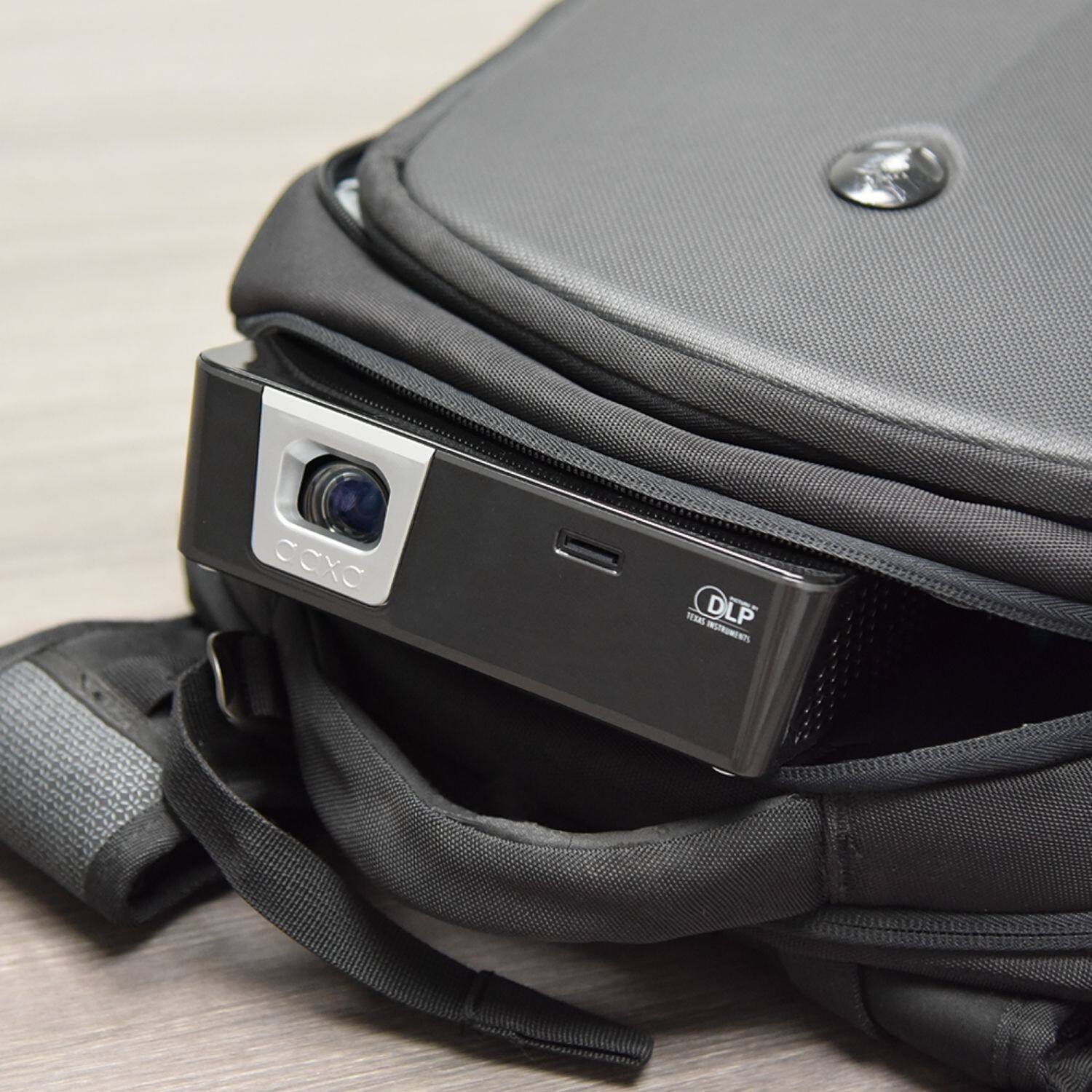 Left. AAXA - P6X DLP Pico Projector, 4 Hour Battery, USB-C Input, Wireless Mirroring, 1000 Lumens, HDMI/USB/TF Input, 1080p Support - Gray/Black.