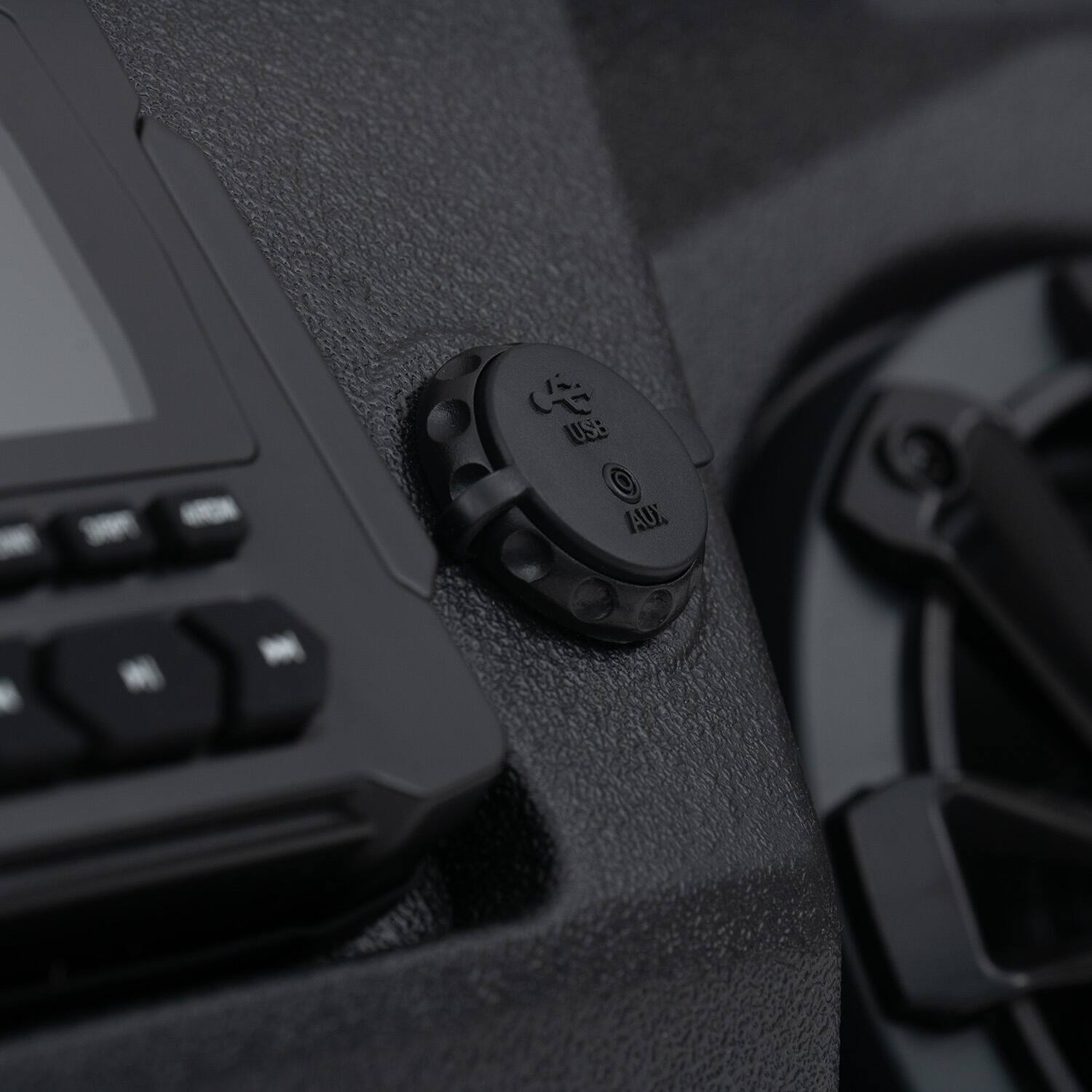 The text on the image reads "AUX."