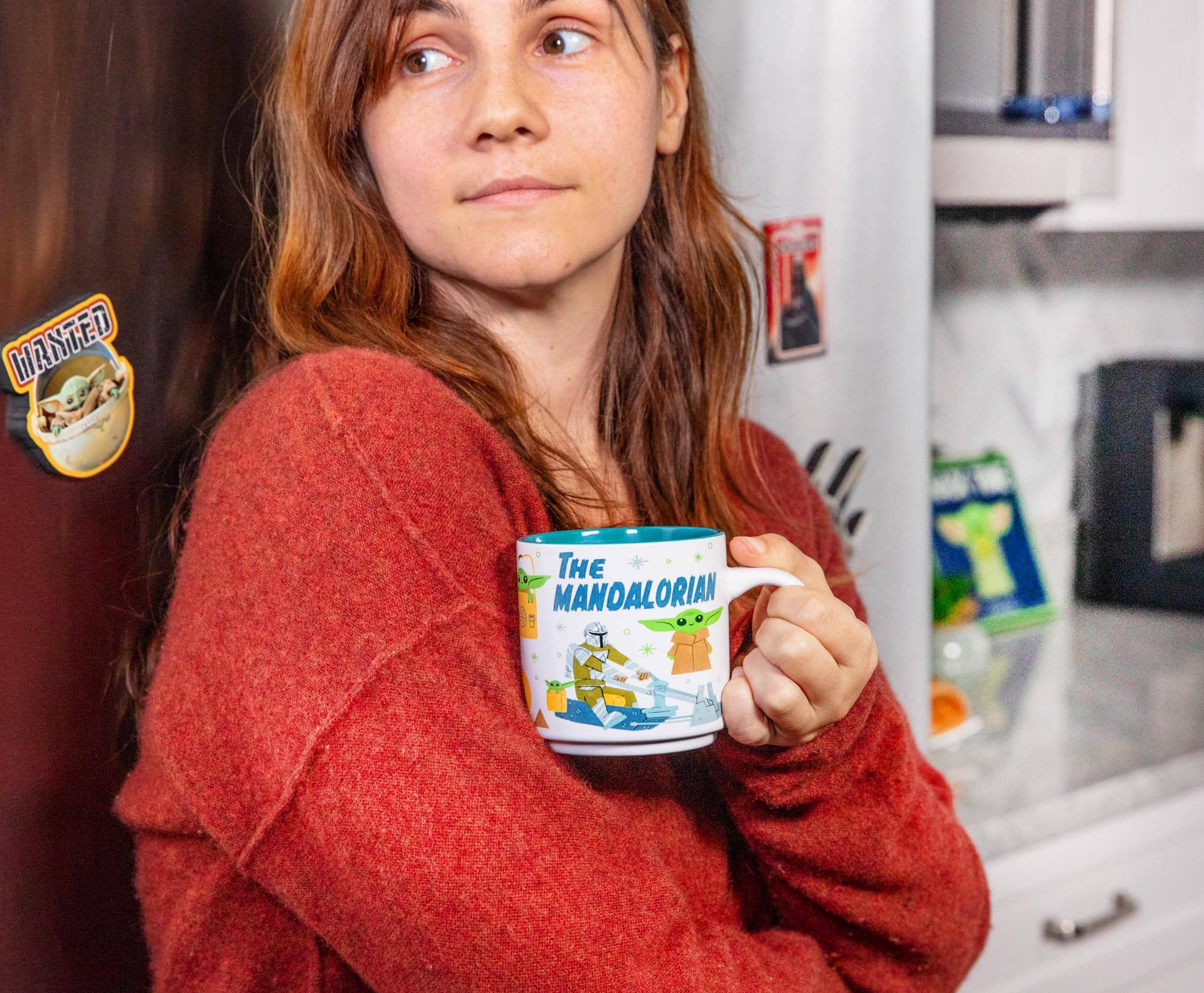 The text on the image reads:

- "WANTED"
- "The Mandalorian"