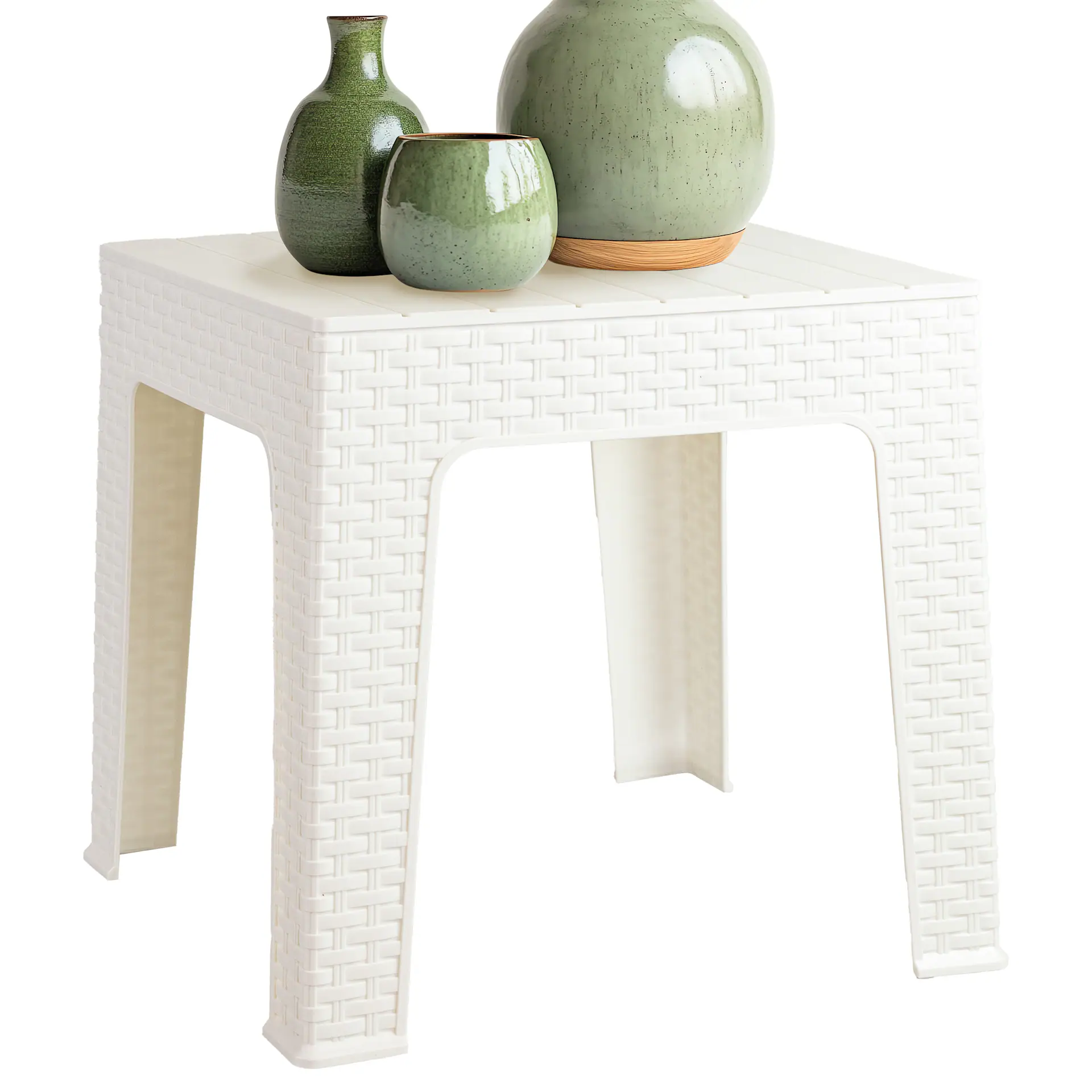 White side table holding decorative vases.