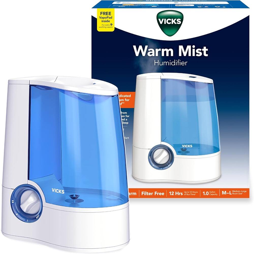 Sure, here is the corrected and grouped text from the image:

---

**VICKS Warm Mist Humidifier**

- **FREE VapoPad inside**  
  For extra soothing mist

- **Filter Free**  
  **12 Hrs** of Run Time  
  **1.0 Gallon** Capacity  
  **M-L** Medium-Large Room Size

- **Warm Mist**  
  **Filter Free**  
  **12 Hrs** of Run Time  
  **1.0 Gallon** Capacity  
  **M-L** Medium-Large Room Size

- **Indicated for**  
  **am for**  
  **from**  
  **on for**  
  **leep fort**

---

This text is grouped and corrected based on the image provided.