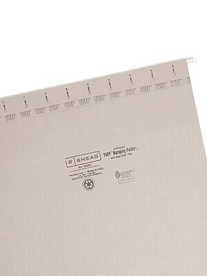 Sure, here is the corrected and grouped text:

---

**SMEAD**

**TUF Hanging Folder**

**TUF** Hanging Folder with Easy Eyelets

**SMEAD**

**Made in USA**

**Recyclable**

**TUF** (Thermoplastic Urethane Film)

**TUF** is a durable, tear-resistant, and water-resistant material.

**TUF** is made from recycled materials and is recyclable.

**TUF** is a registered trademark of SMEAD.

---

This text is likely found on the back of a SMEAD TUF Hanging Folder.